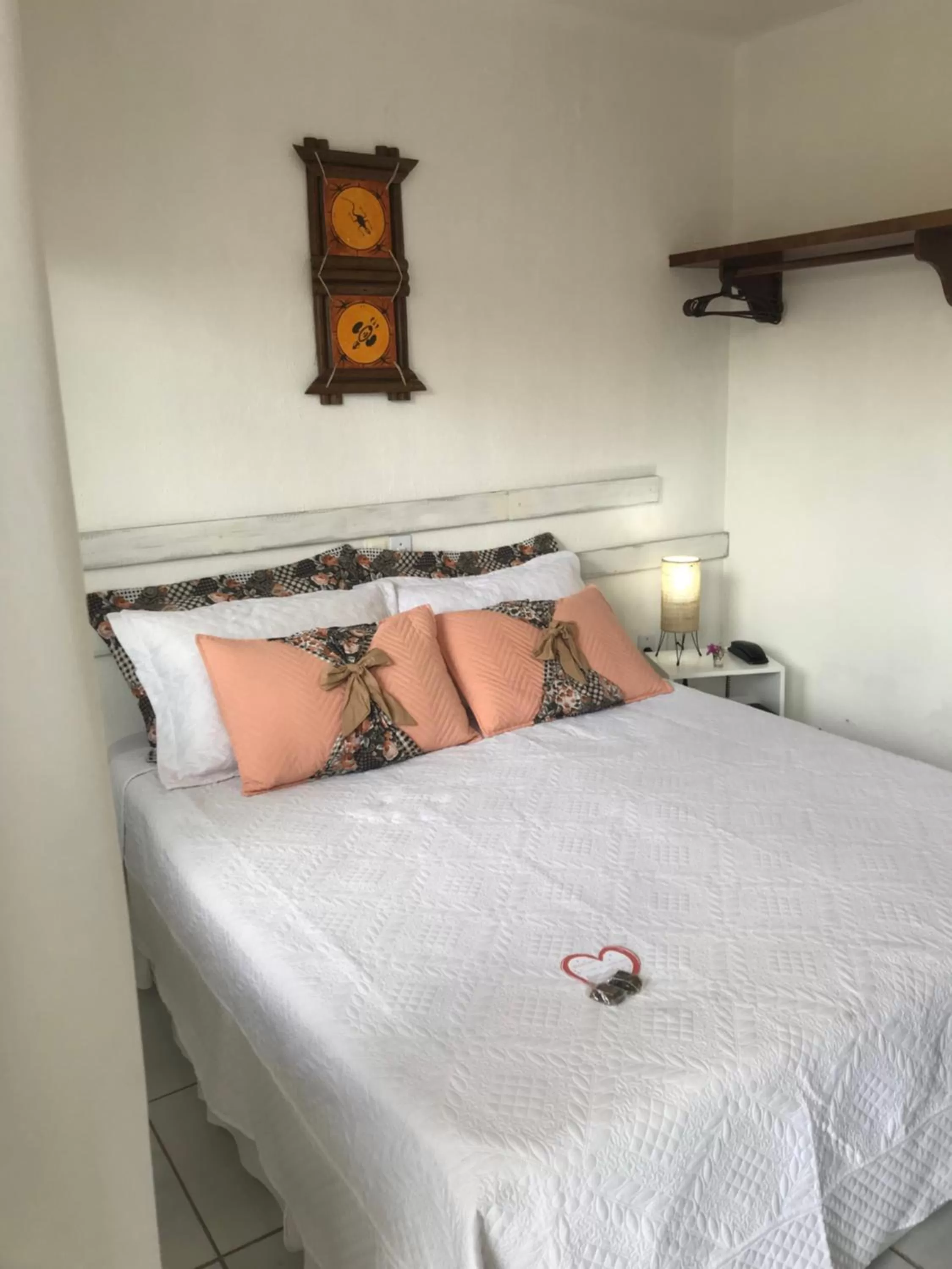 Bed in Pousada America do Sol