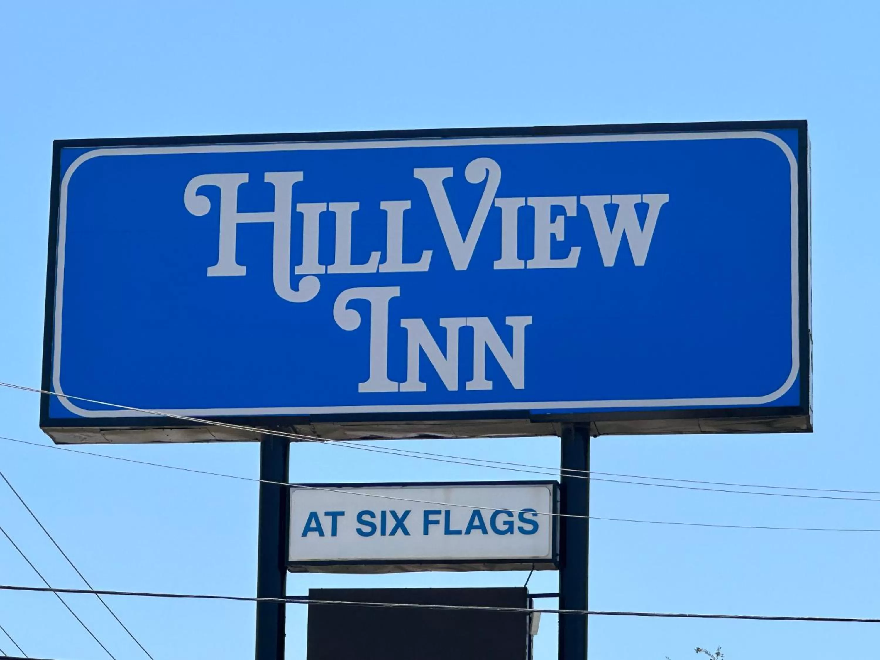 Property logo or sign in HillView Inn at Six Flags Fiesta