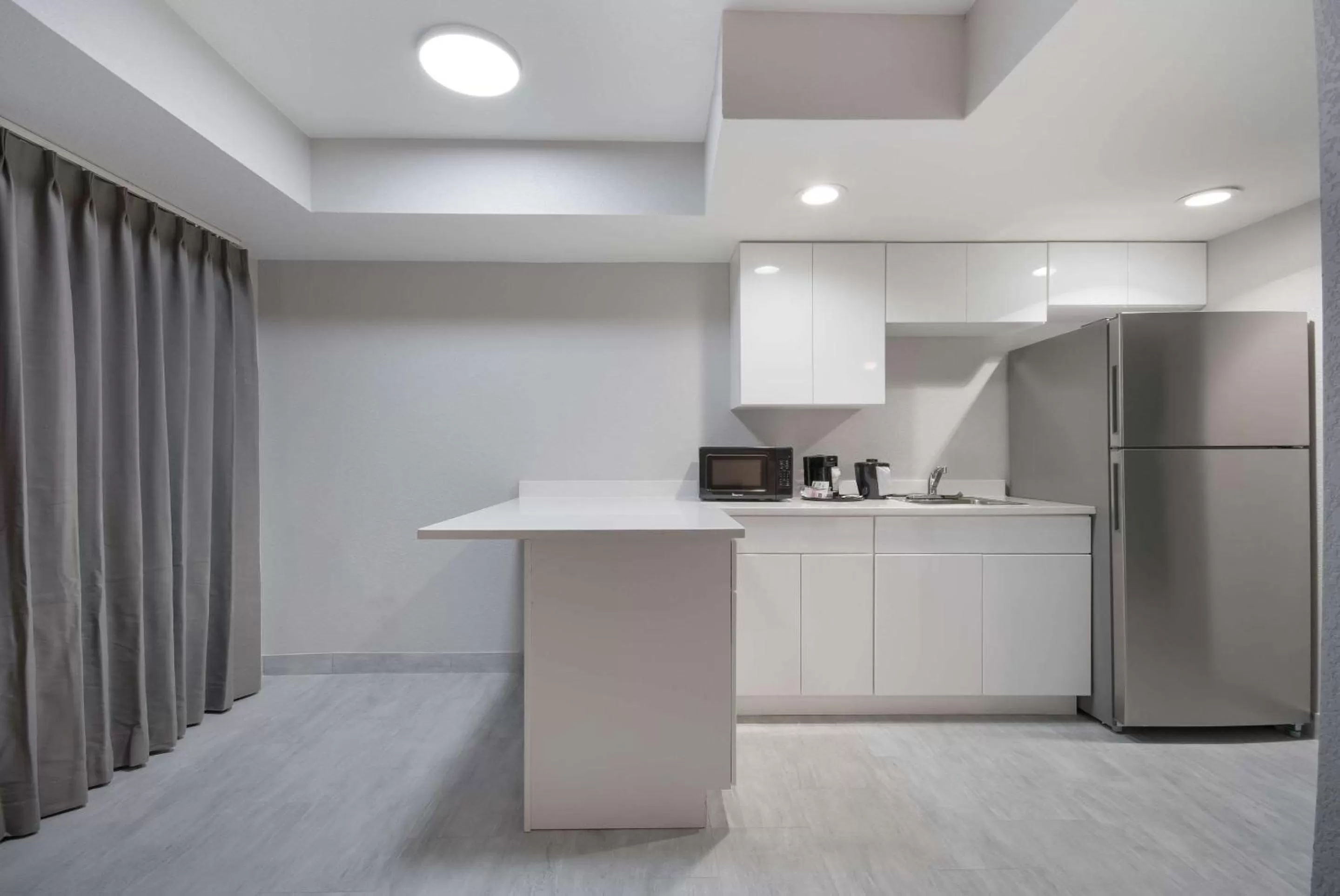 Bedroom in Clarion Pointe OKC Airport