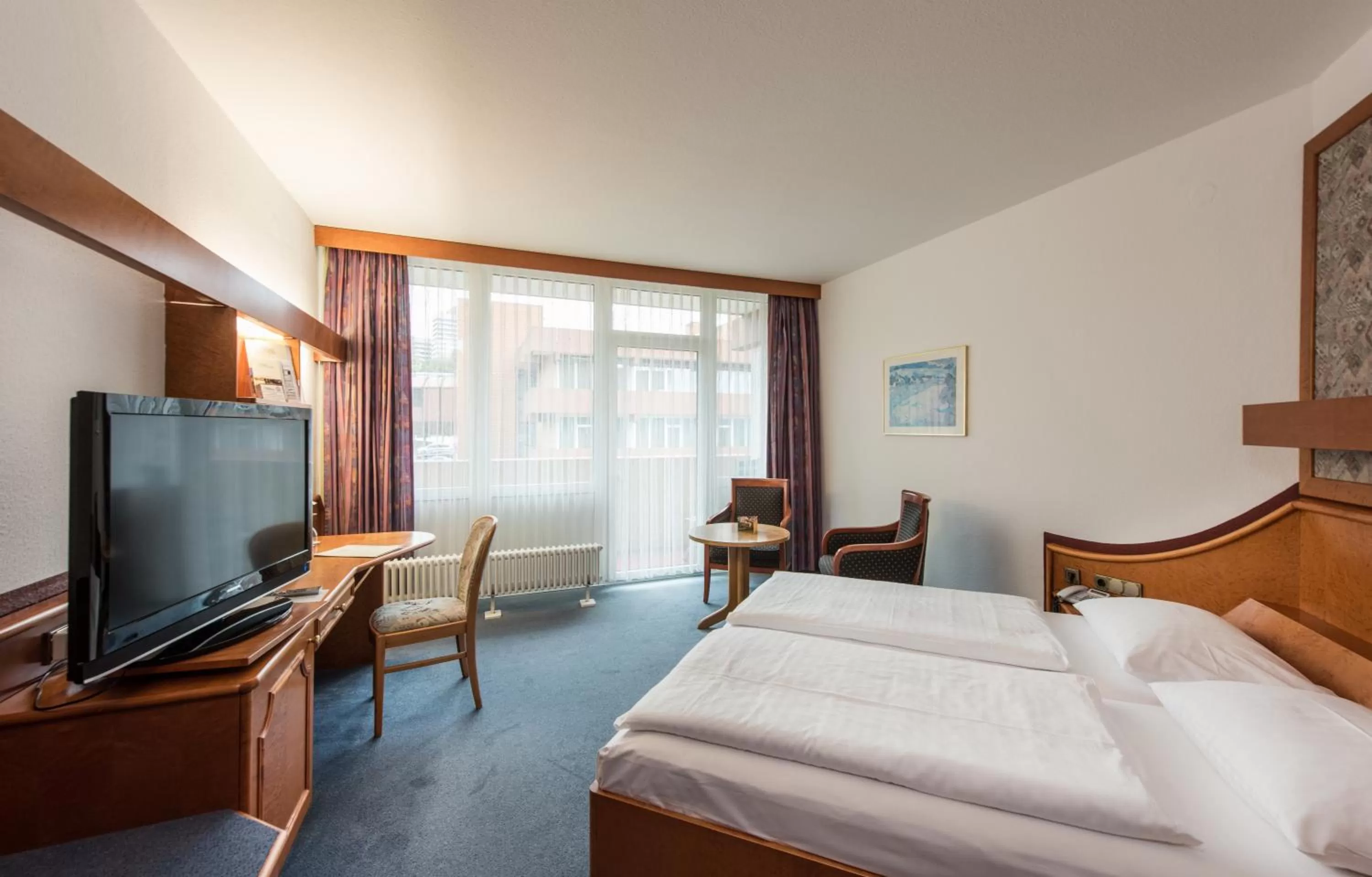 Photo of the whole room, Bed in Göbels Hotel Rodenberg