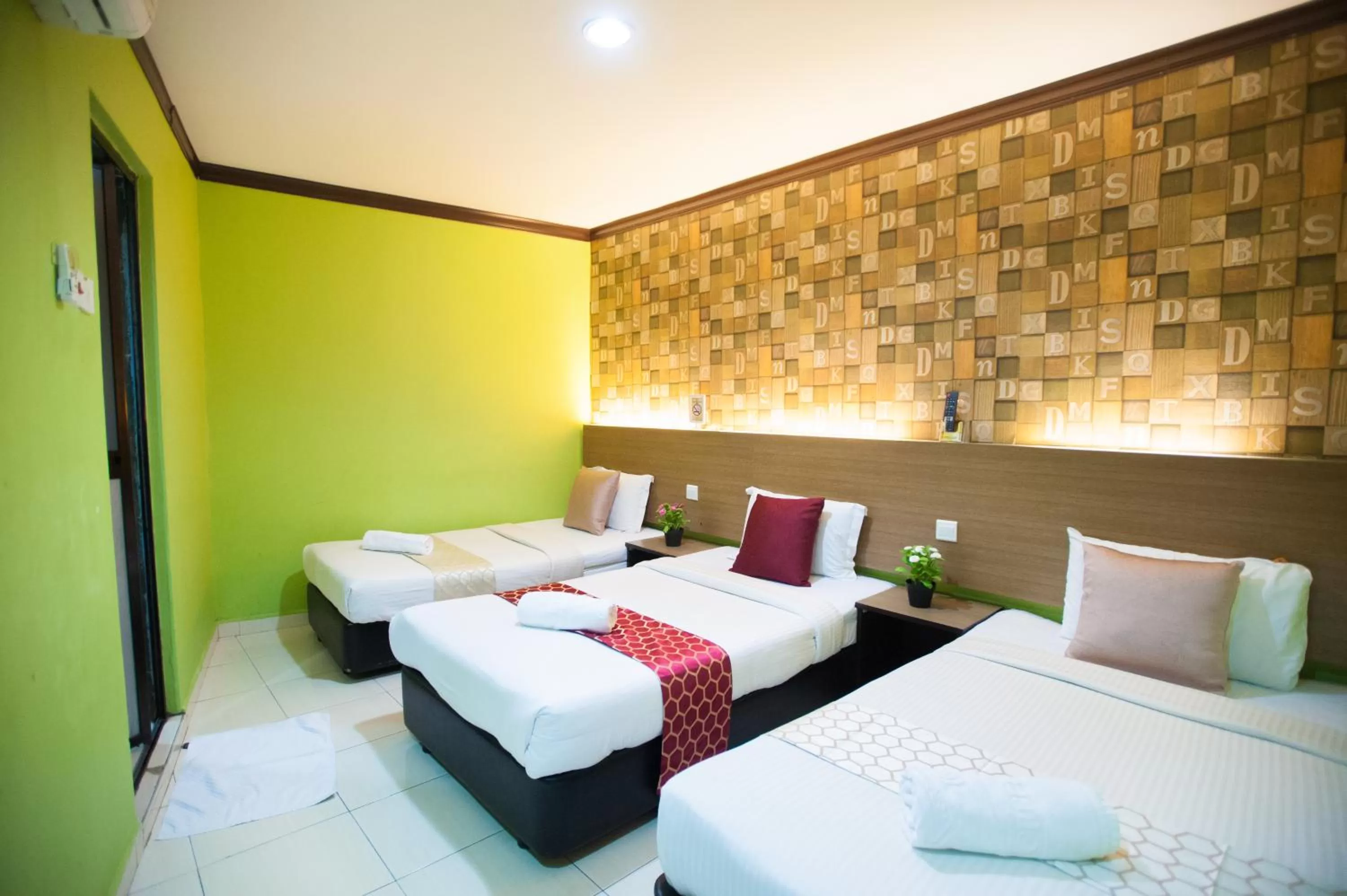 Bed in DJ Citi Point Hotel