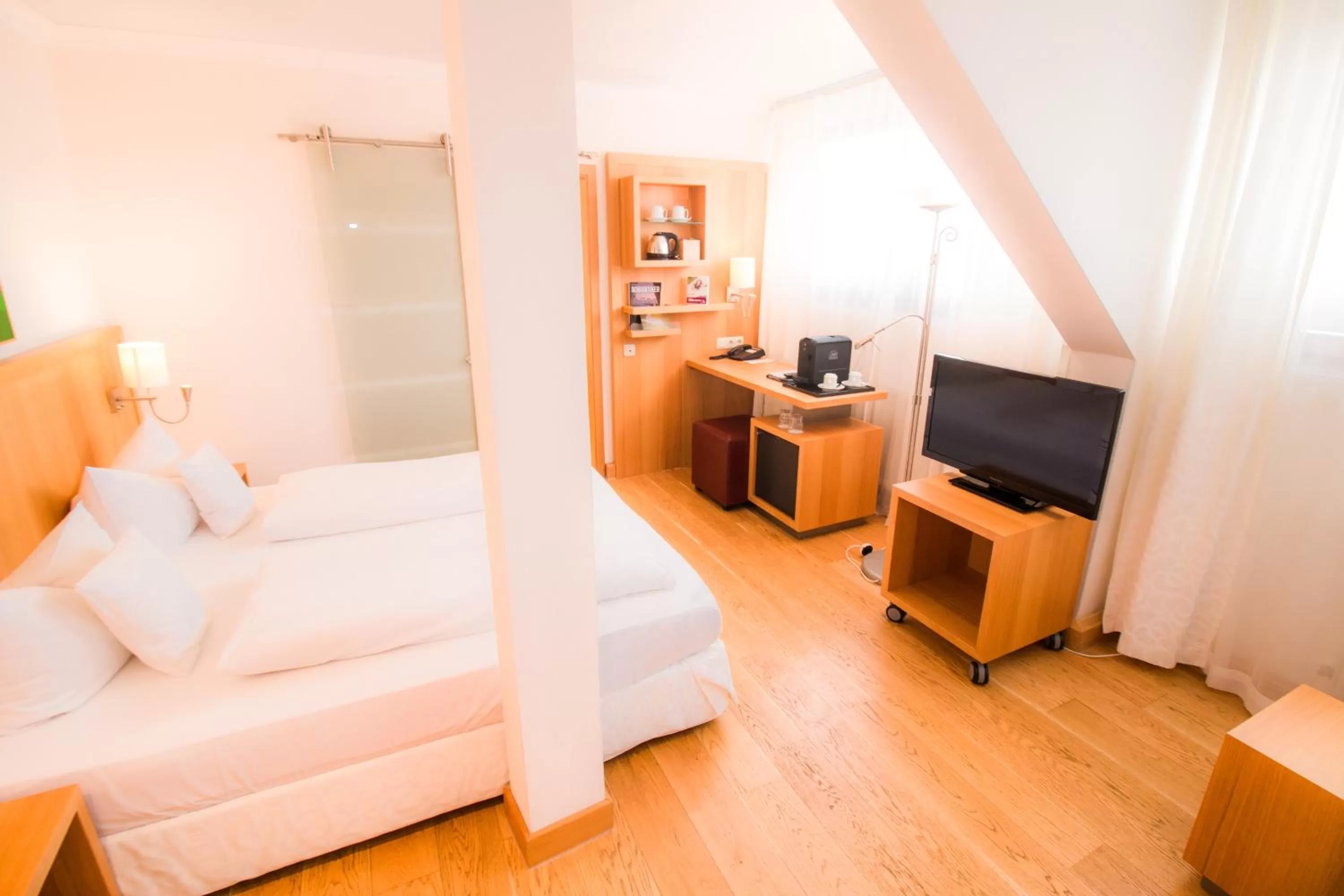 Photo of the whole room, Bed in Romantik Hotel Hirschen