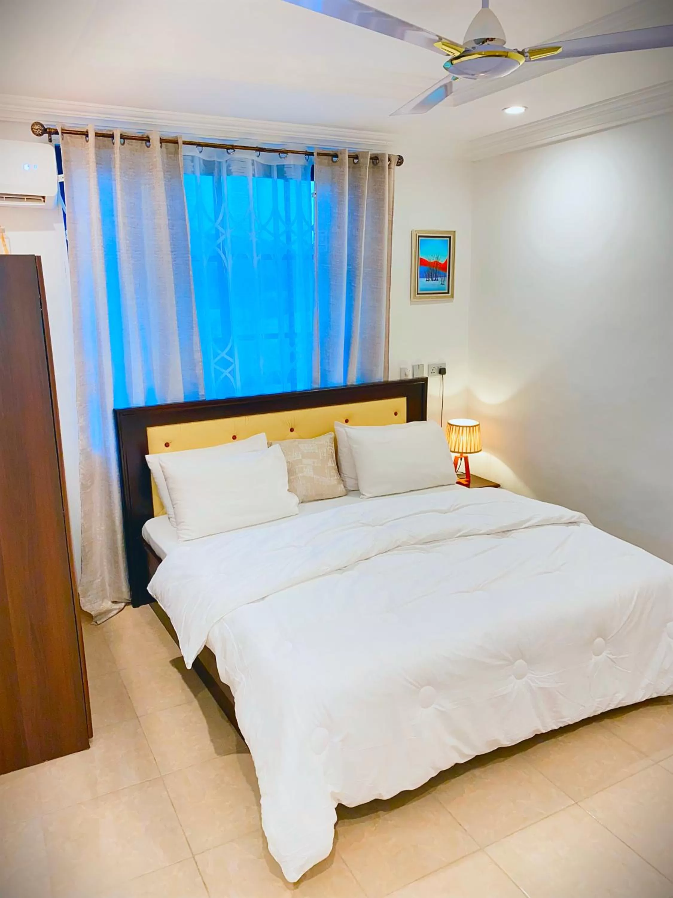 Bed in AIDEN HOMES AND APARTMENTS