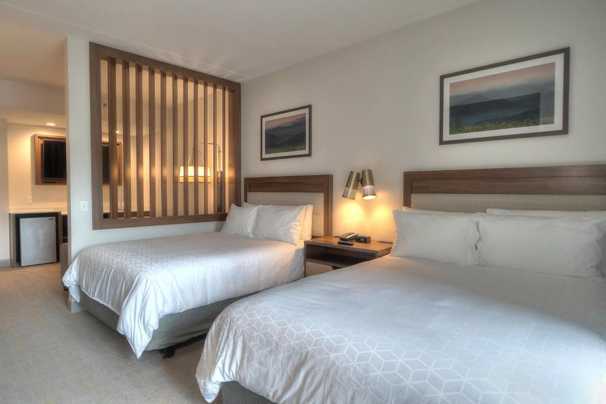 Photo of the whole room, Bed in Holiday Inn & Suites Pigeon Forge Convention Center by IHG