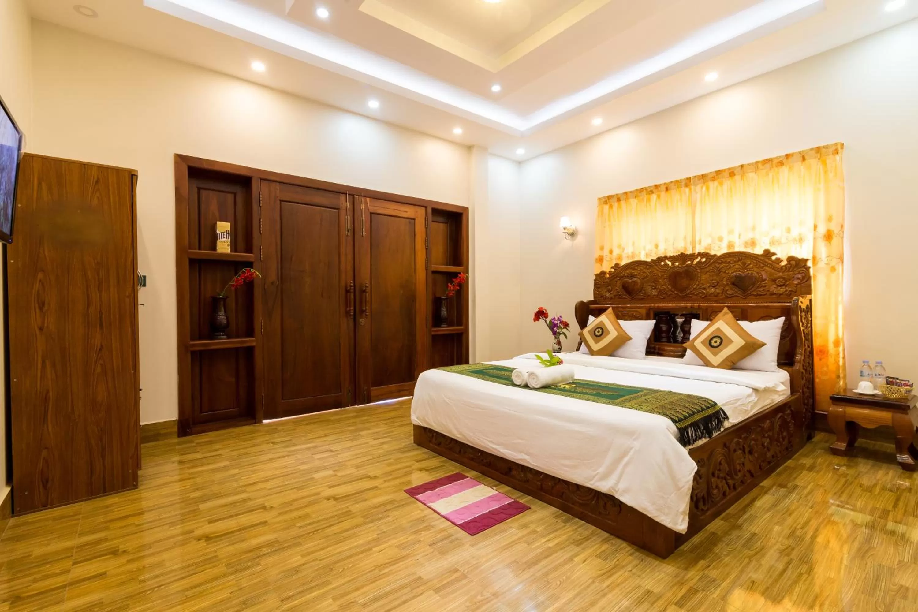 Photo of the whole room, Bed in Aniza Angkor Villa
