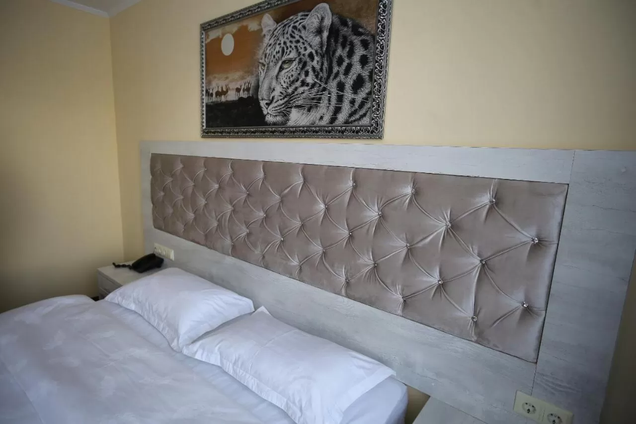 Bed in Altai Business Hotel