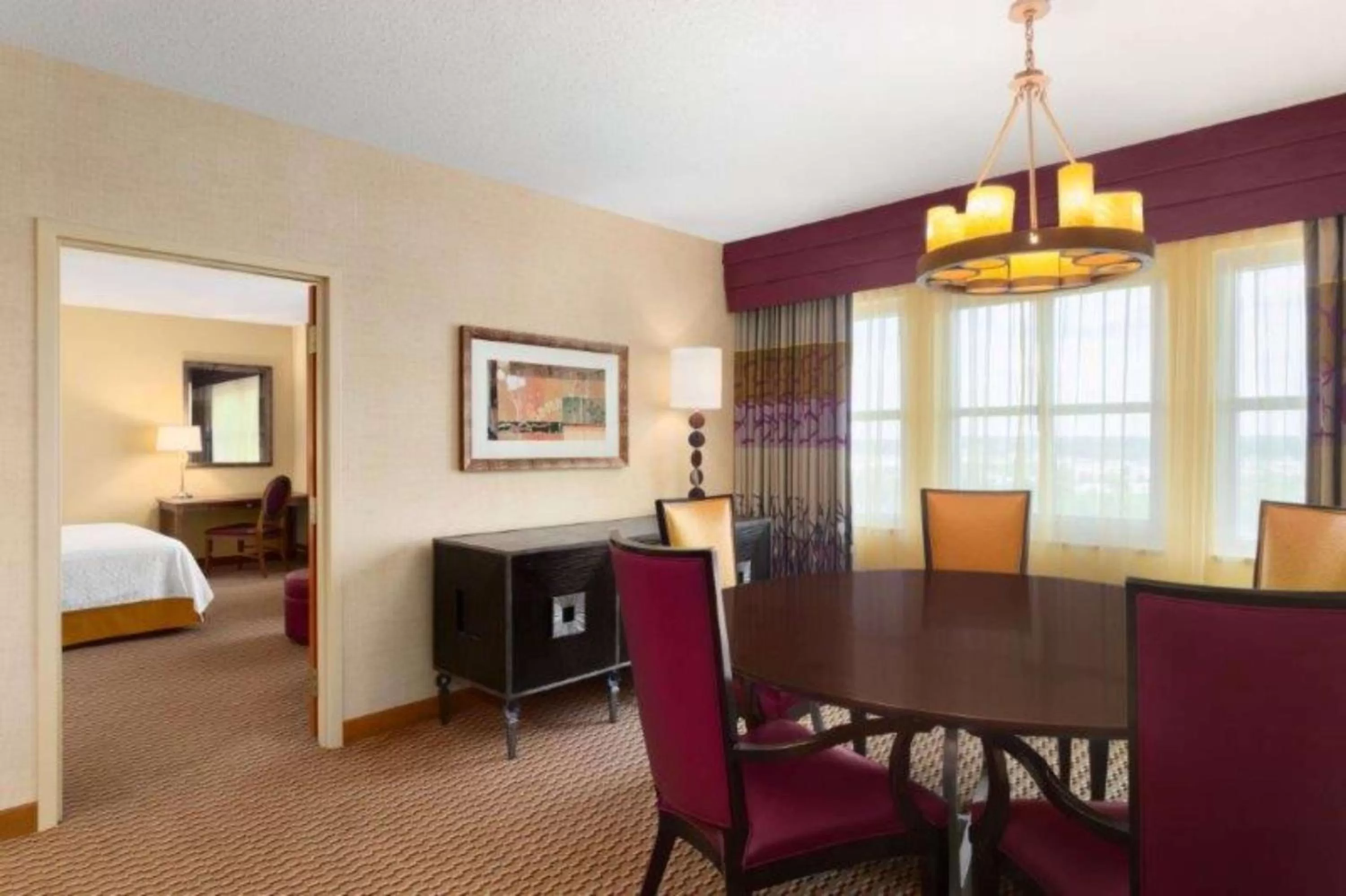 Living room, Bed in Embassy Suites Northwest Arkansas - Hotel, Spa & Convention Center