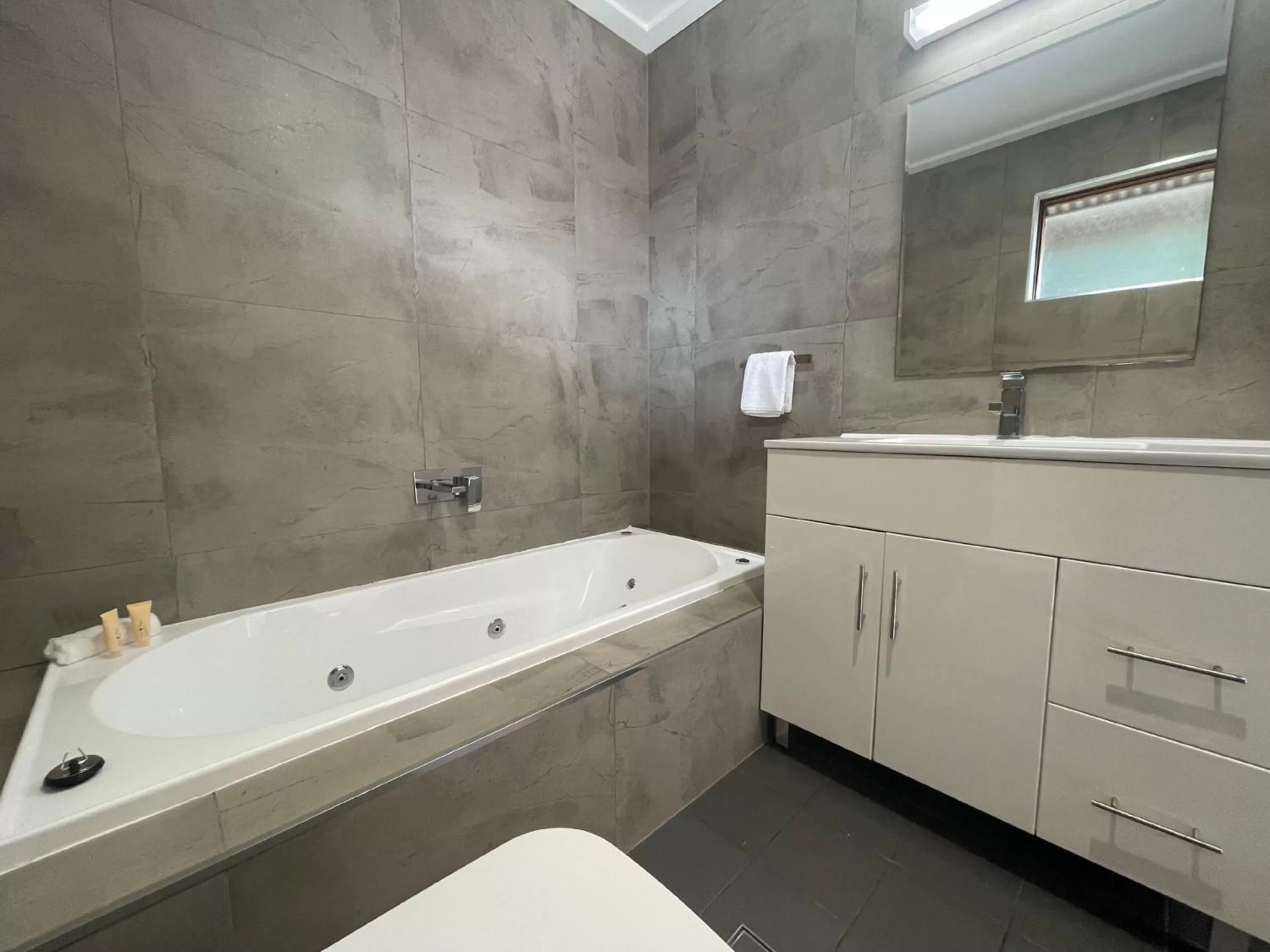 Bathroom in Town & Country Motor Inn