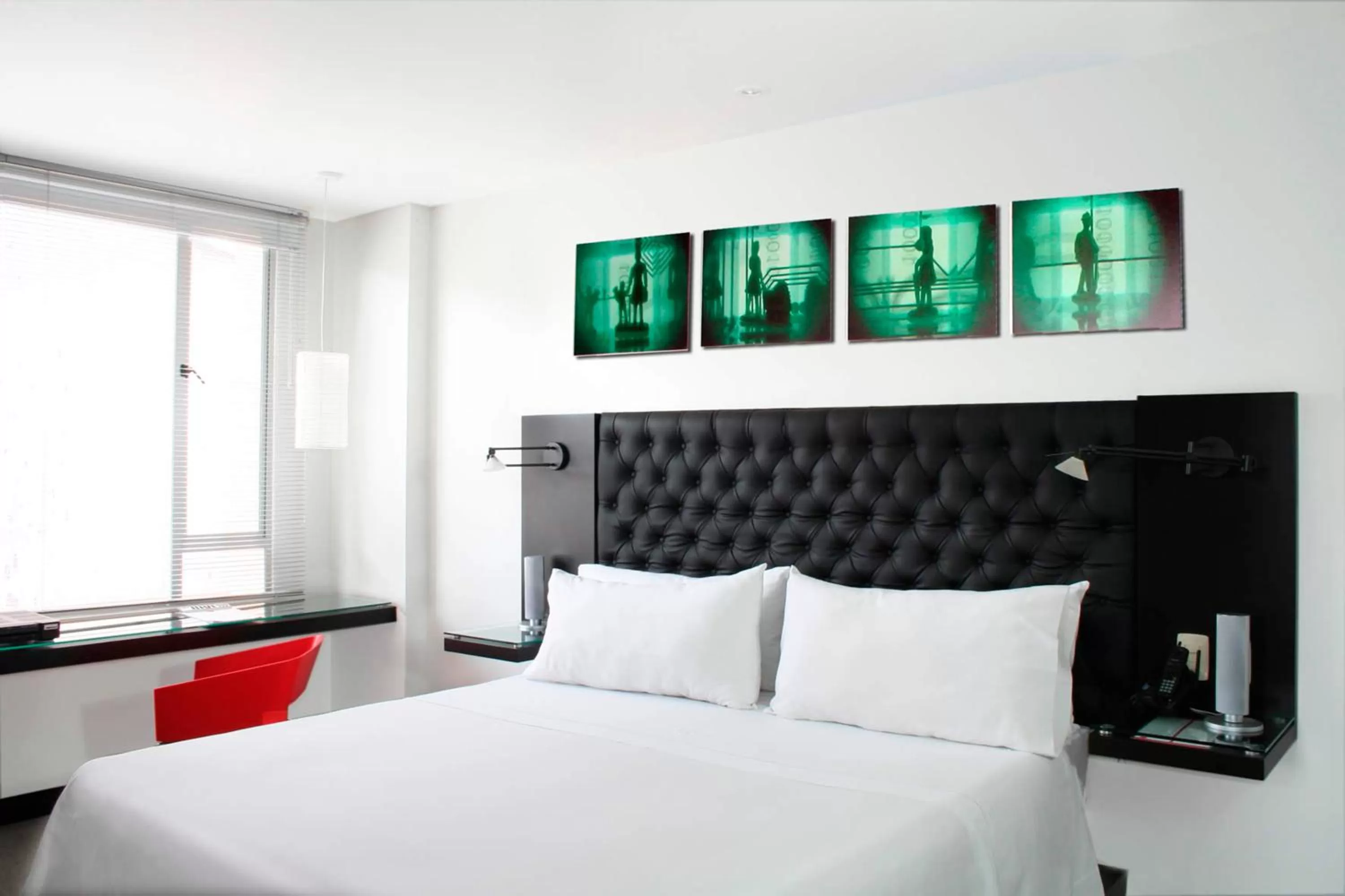 Bed in Hotel 104 Art Suites