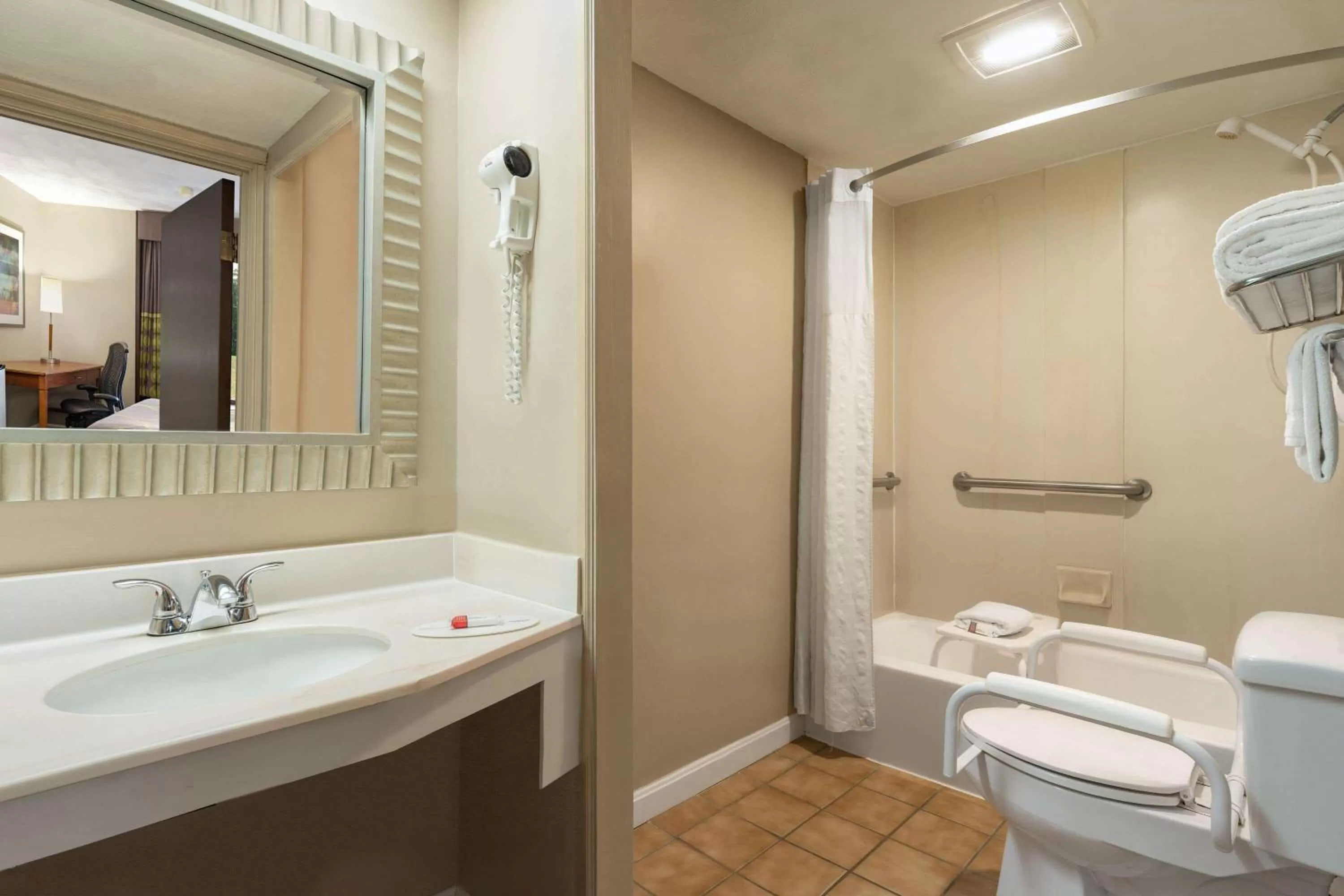 Bathroom in Super 8 by Wyndham West Greenwich/Providence