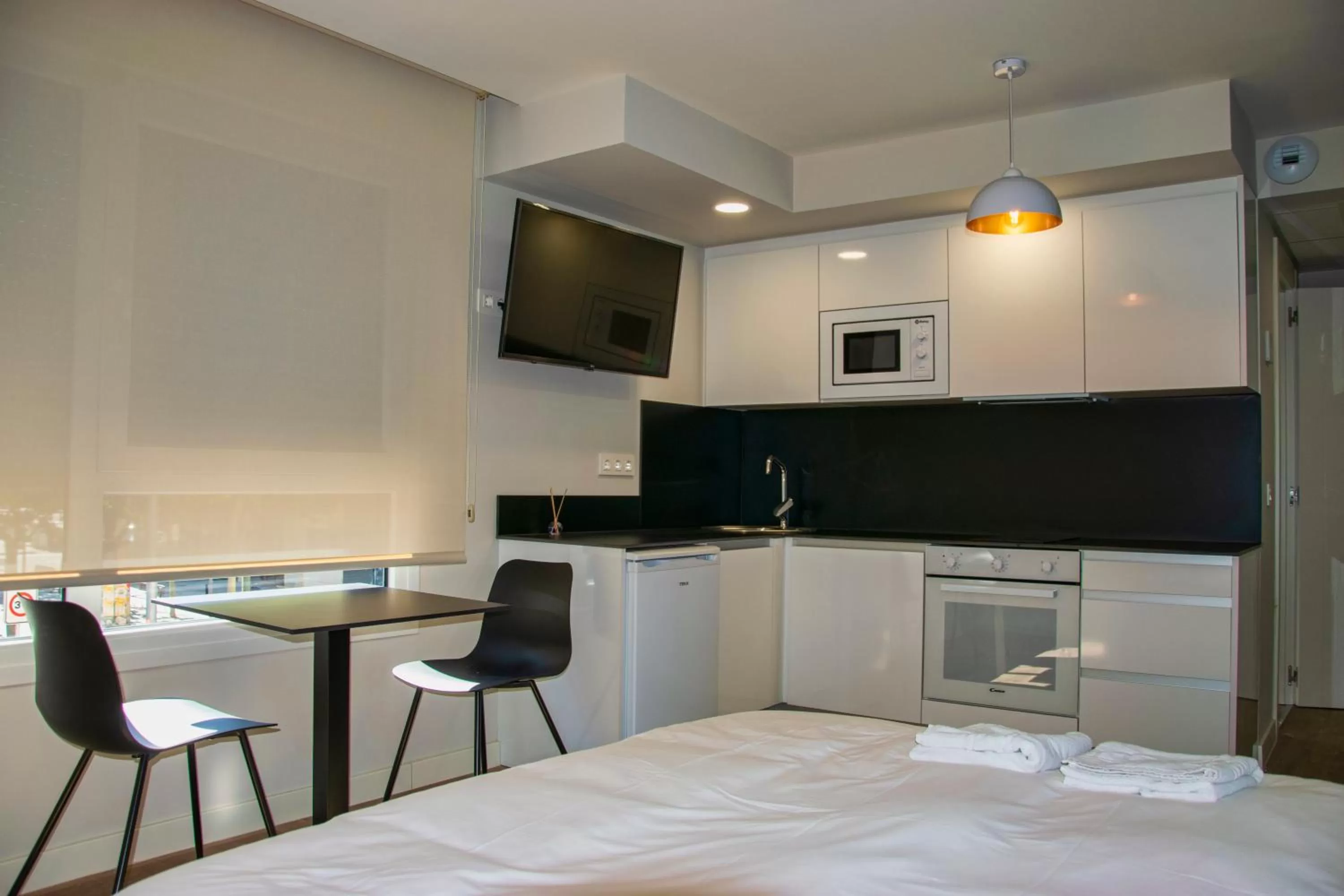 Kitchen or kitchenette in Aparthotel Essenzia de Castilla