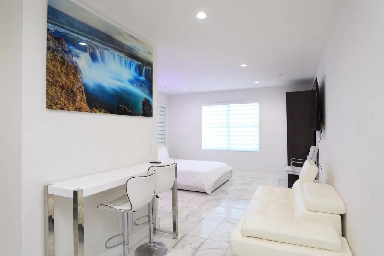 Bed, Seating Area in Sea Breeze