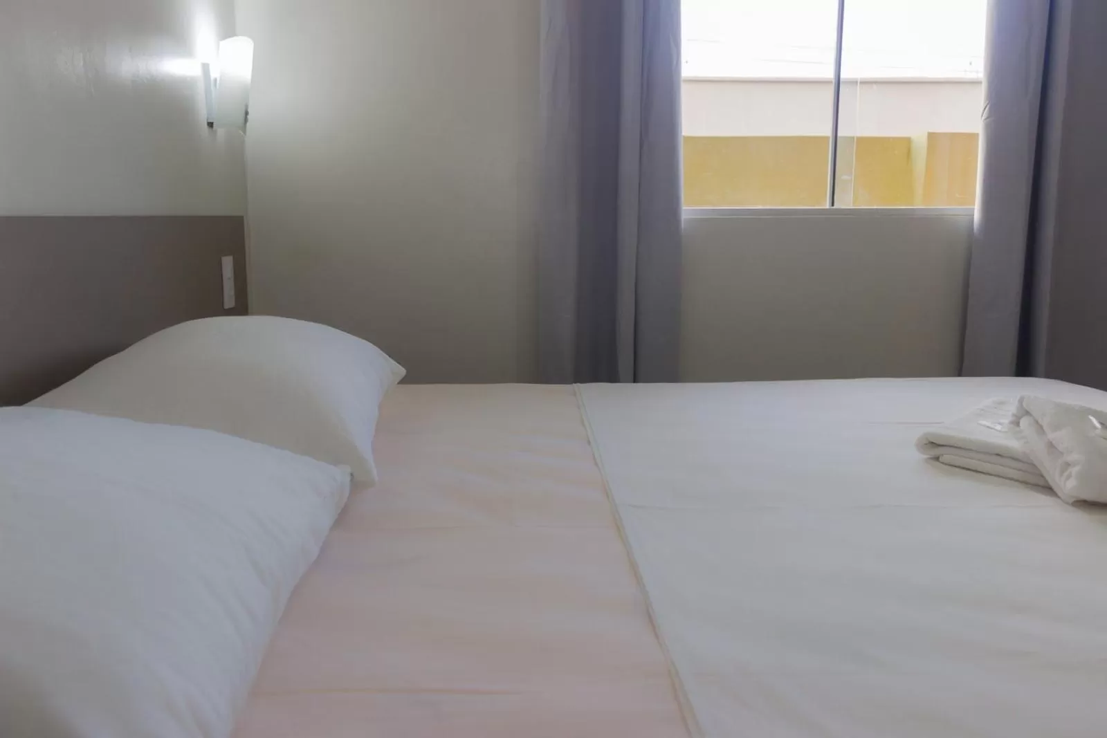 Bed in Pousada Vila do Carmo