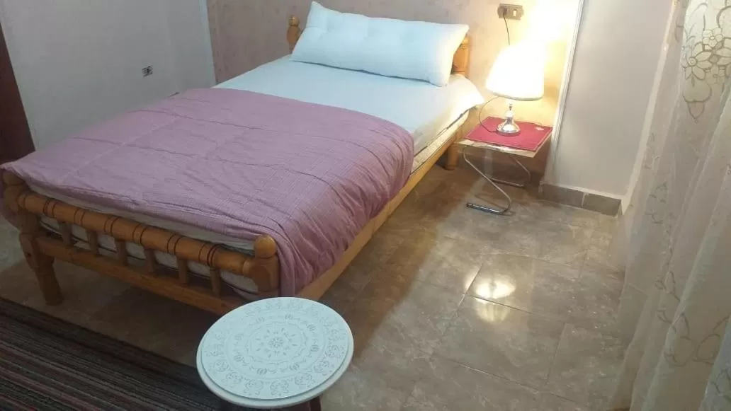 Bed in pyramid Giza city inn