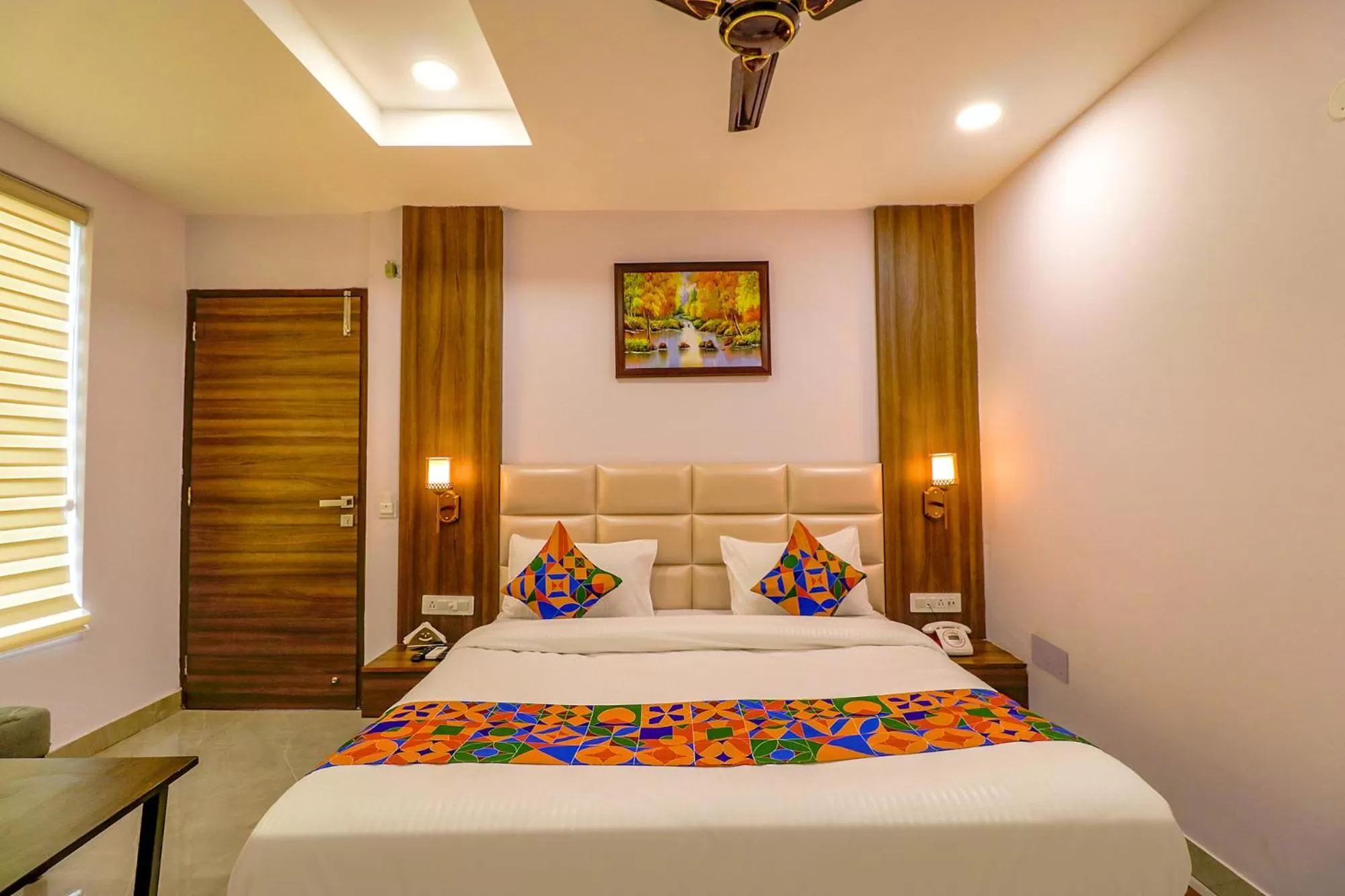 Bed in FabHotel Prime K9 Regency