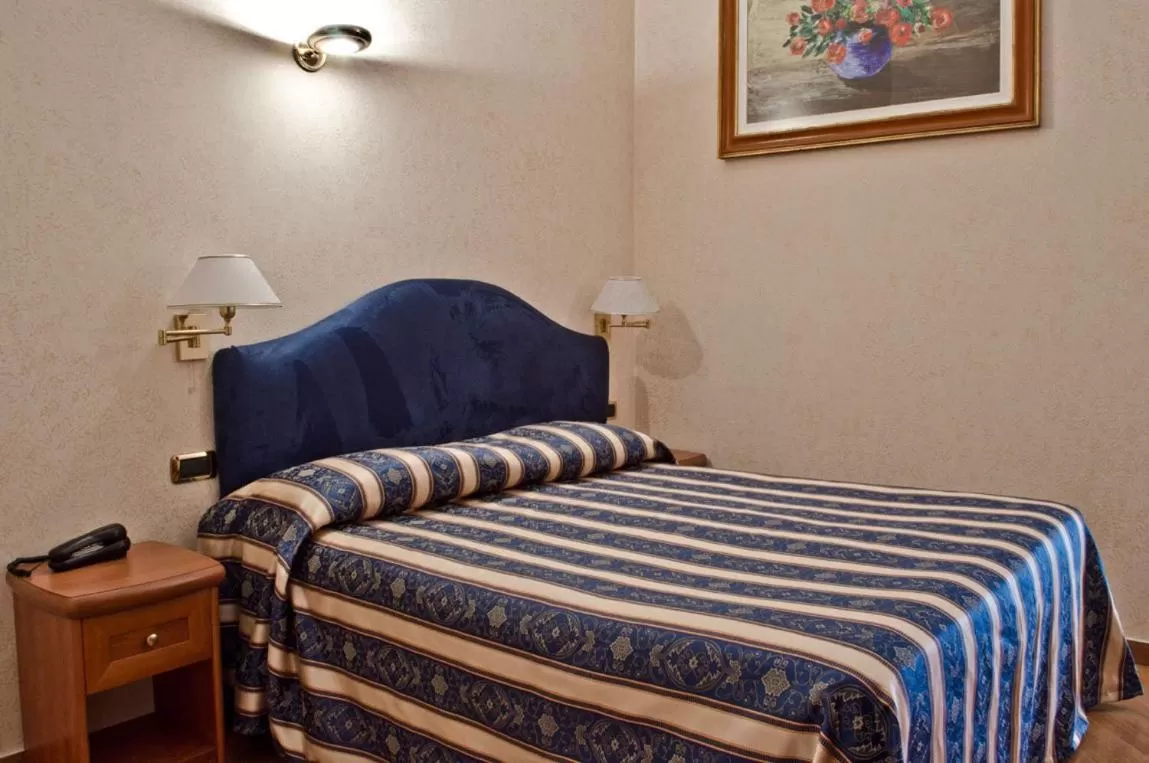 Bed in Hotel Brignole