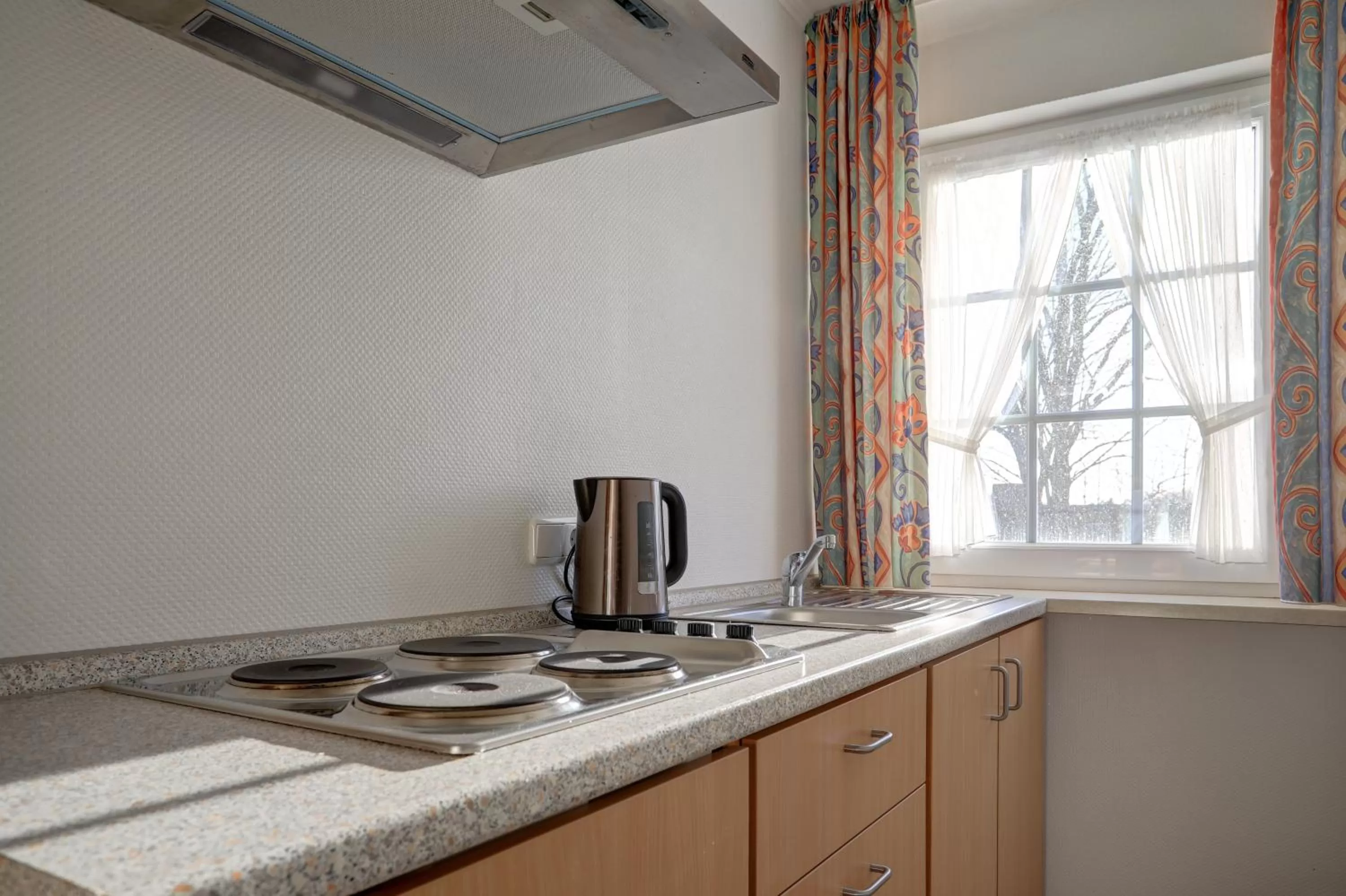 Kitchen or kitchenette in Stössels Hotel