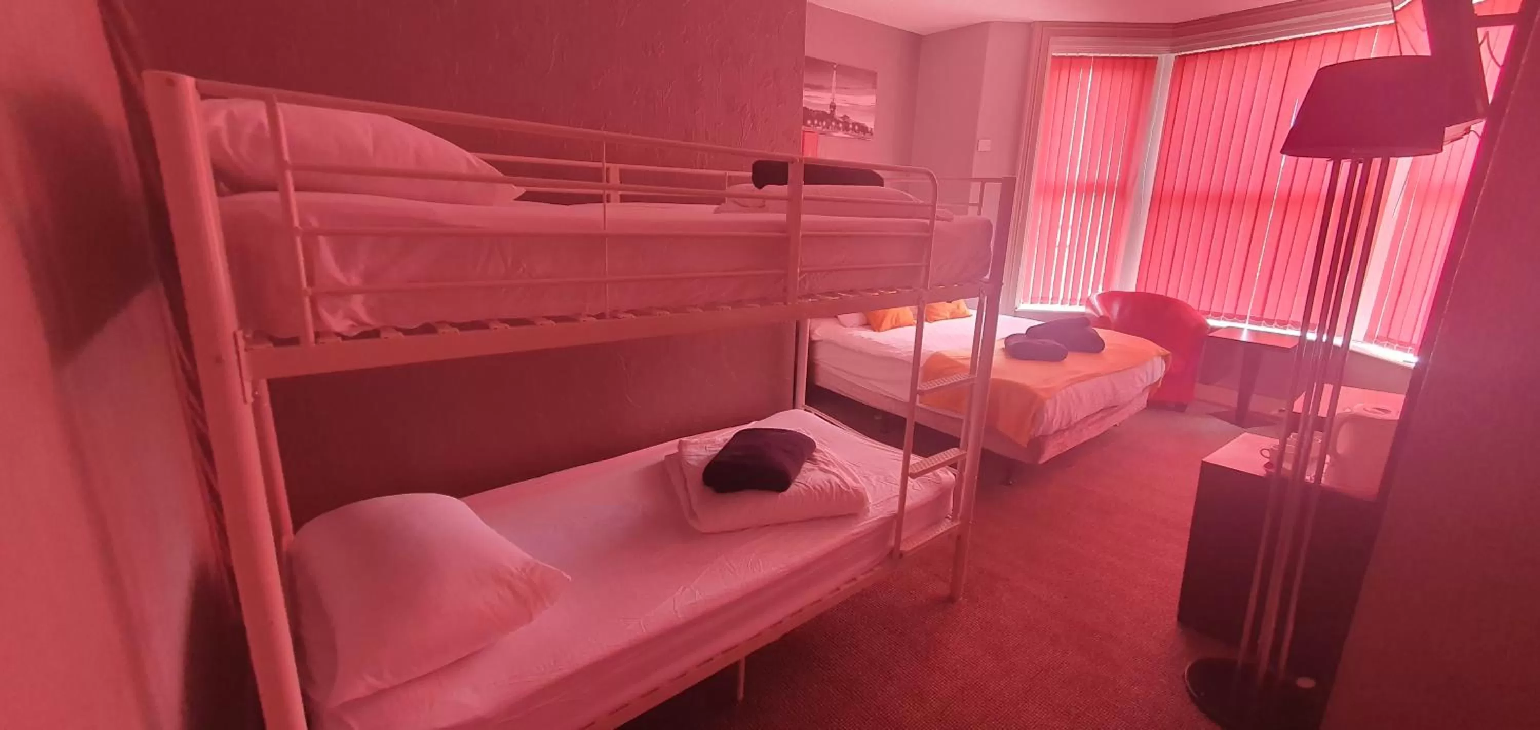 Bed in Palm Beach Hotel by the Sea