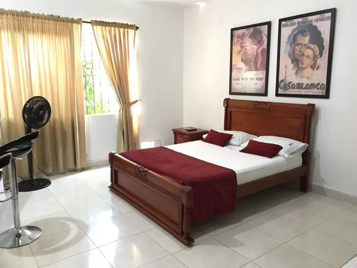 Bed in Arco Apartasuites