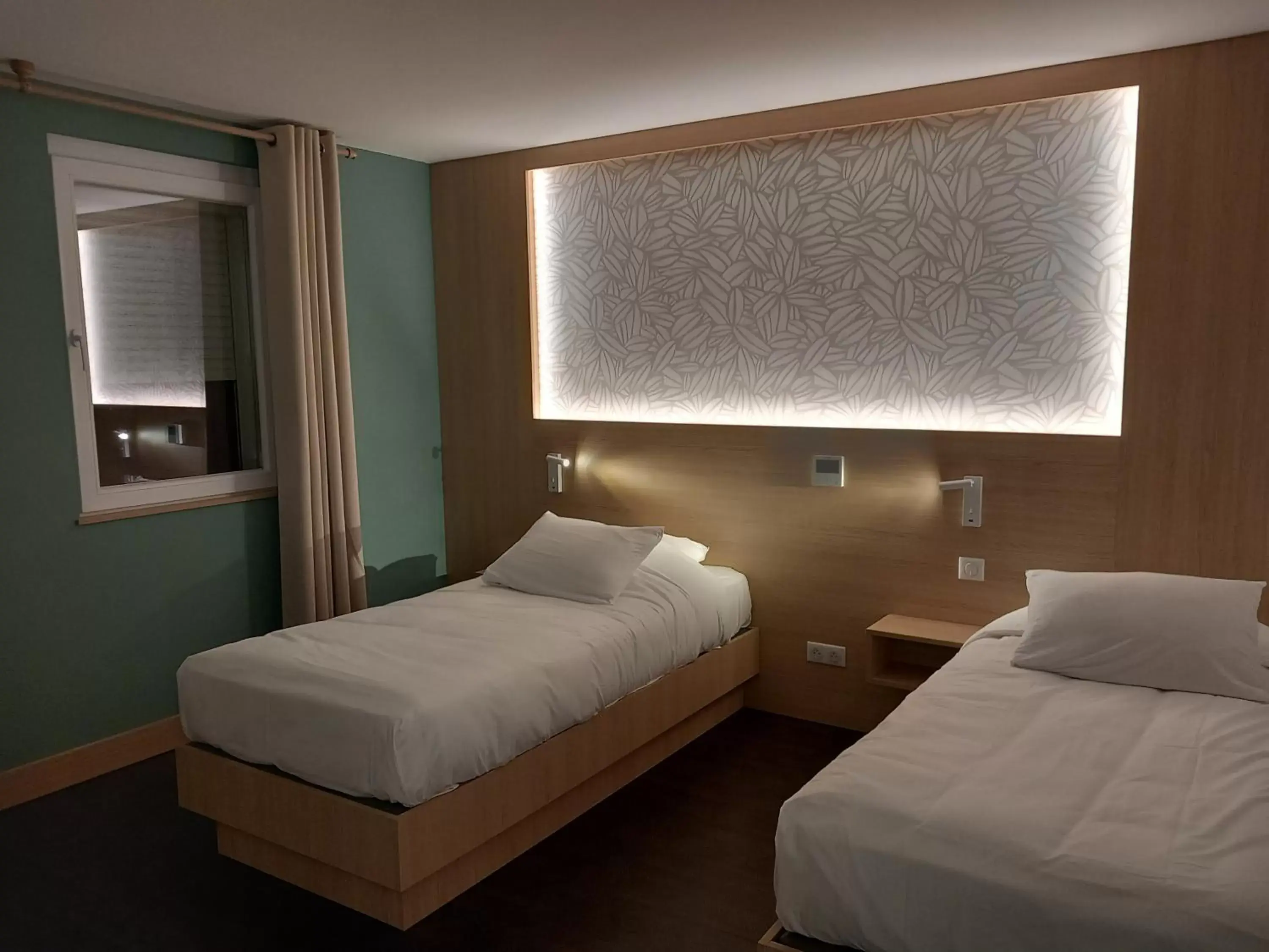 Twin Room in Hôtel Aster Restaurant Aux Arcades Twin Room in Hôtel Aster Restaurant Aux Arcades