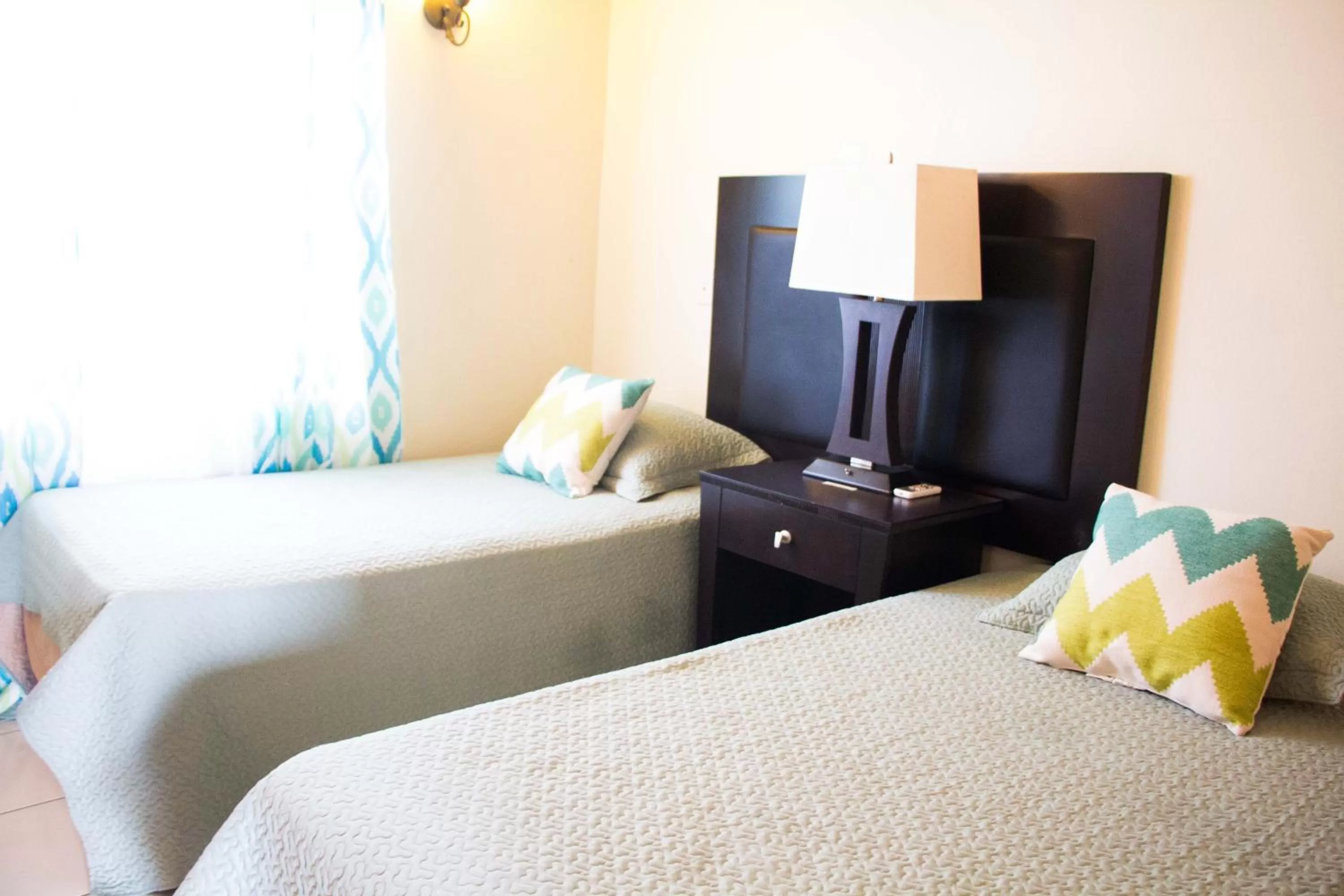 Bed in Connie's Comfort Suites