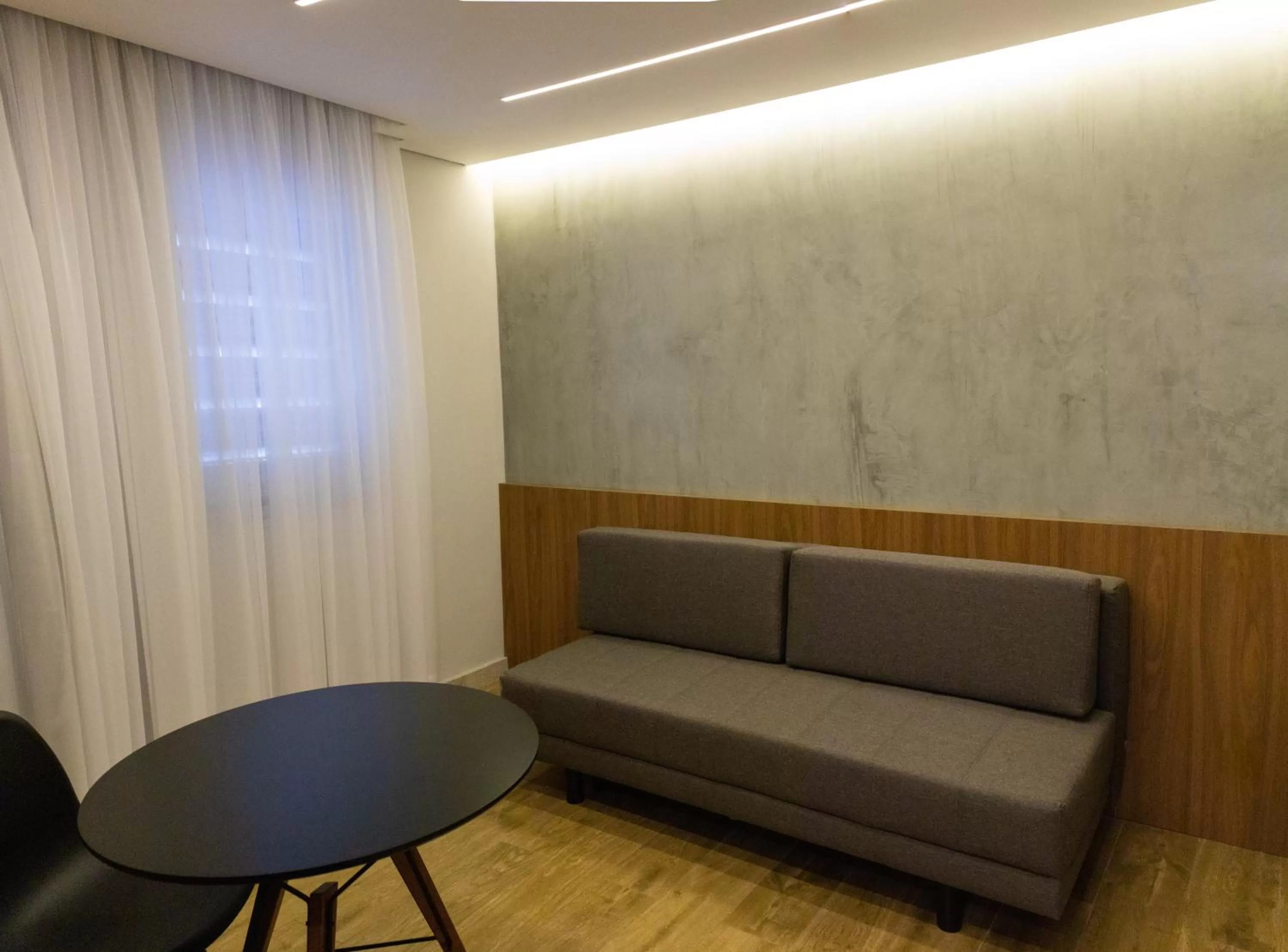 Living room in VOA Plazza Hotel