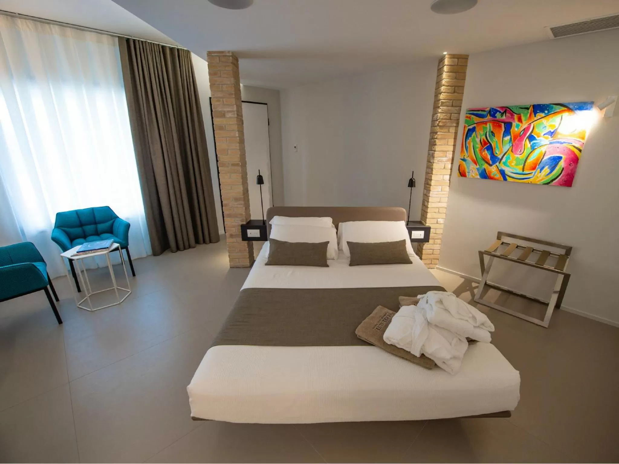 Living room, Bed in Serre Alte Landscape Luxury Rooms