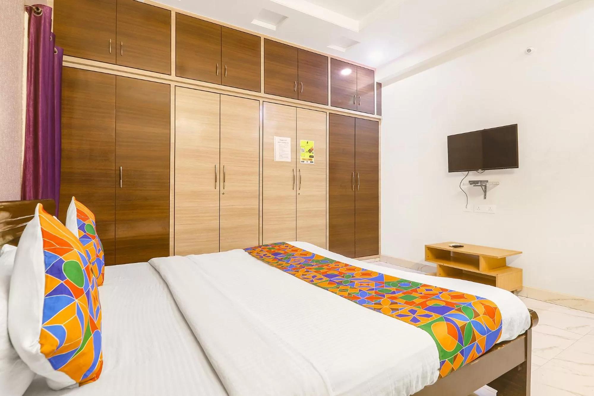 Communal lounge/ TV room, Bed in FabHotel Golden Gate - Nr Hitech City