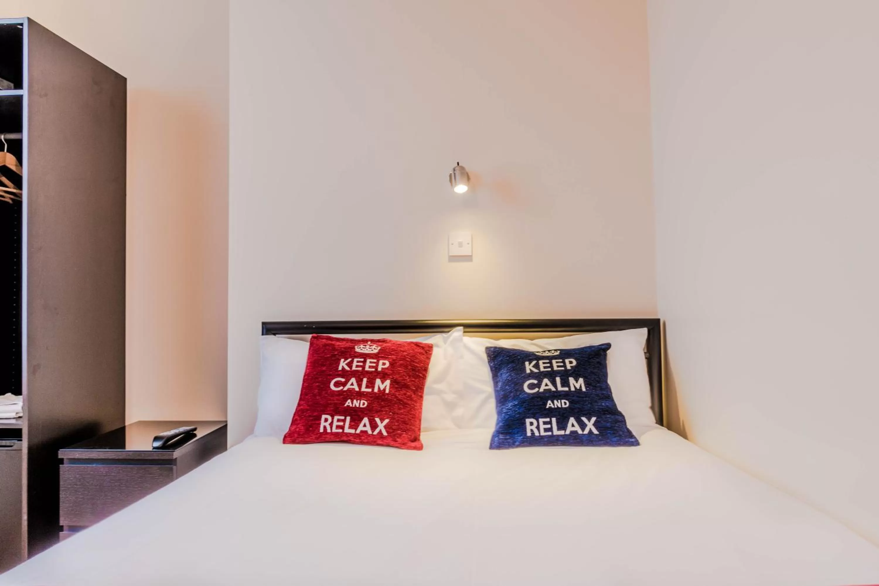 Bed in Hellenic Hotel by Saba