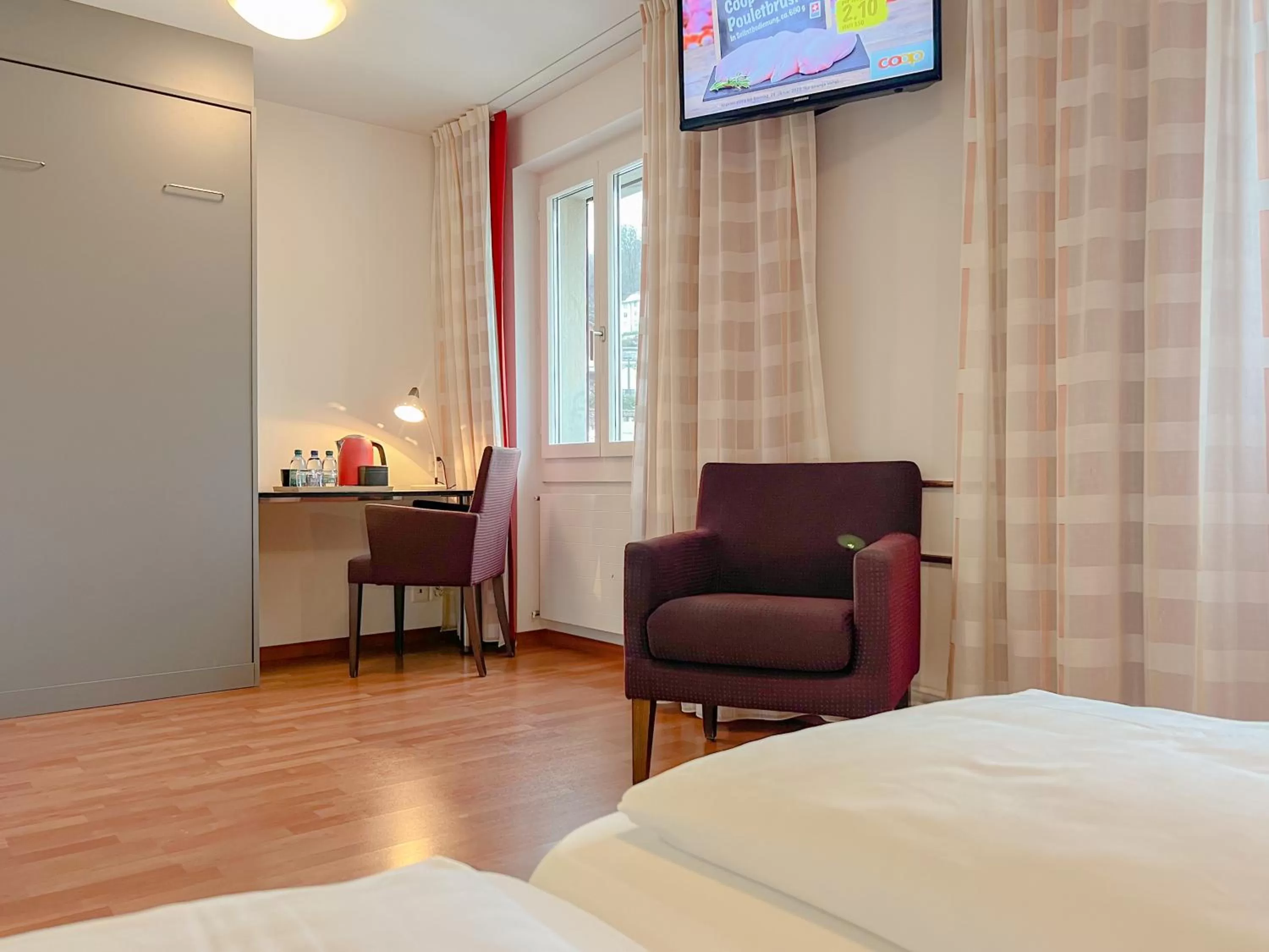 Bed in Hotel Rothaus Luzern & Peruvian Culinary Art