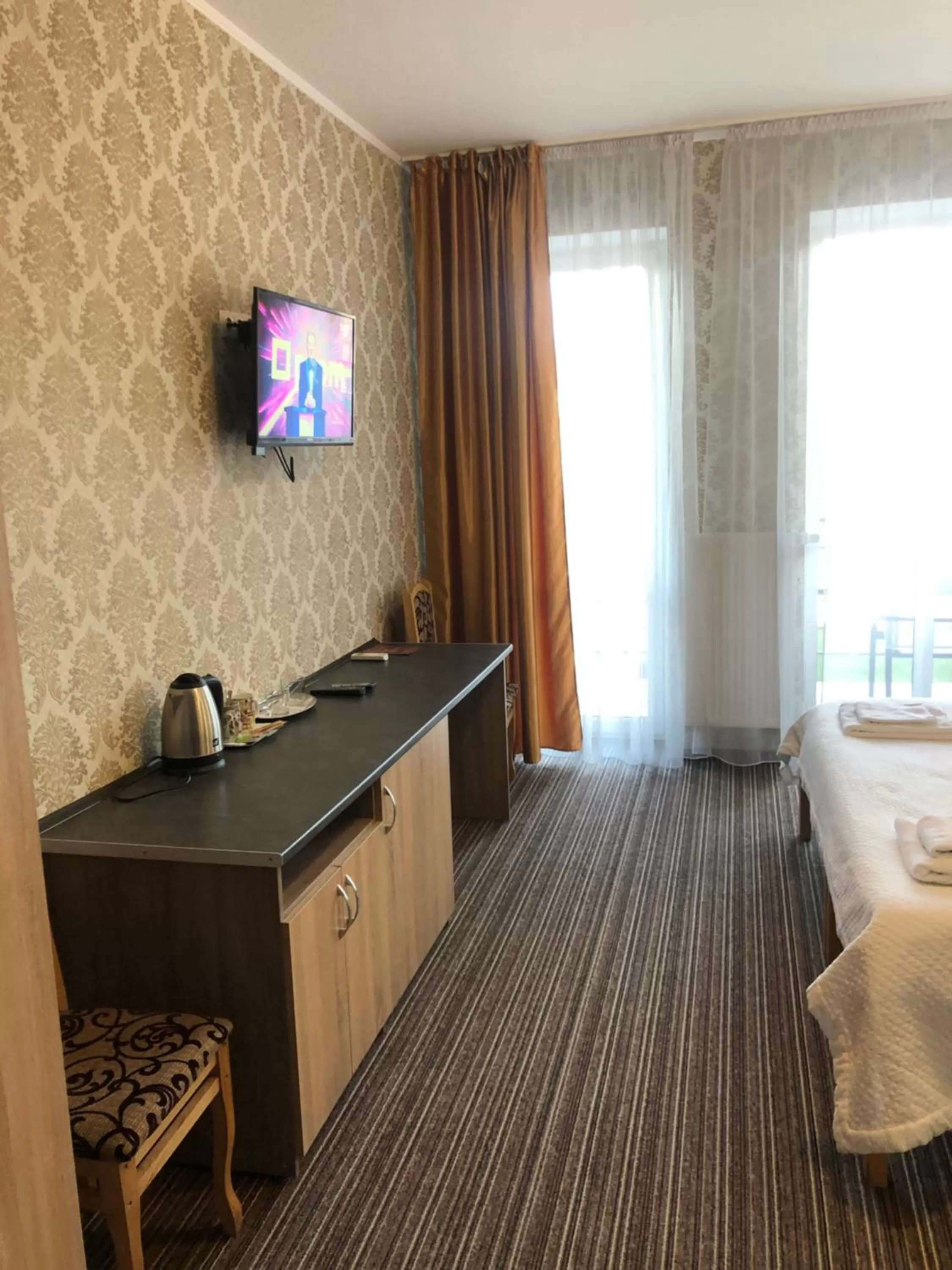 TV/Entertainment Center in Motel Kurortnyy & SPA