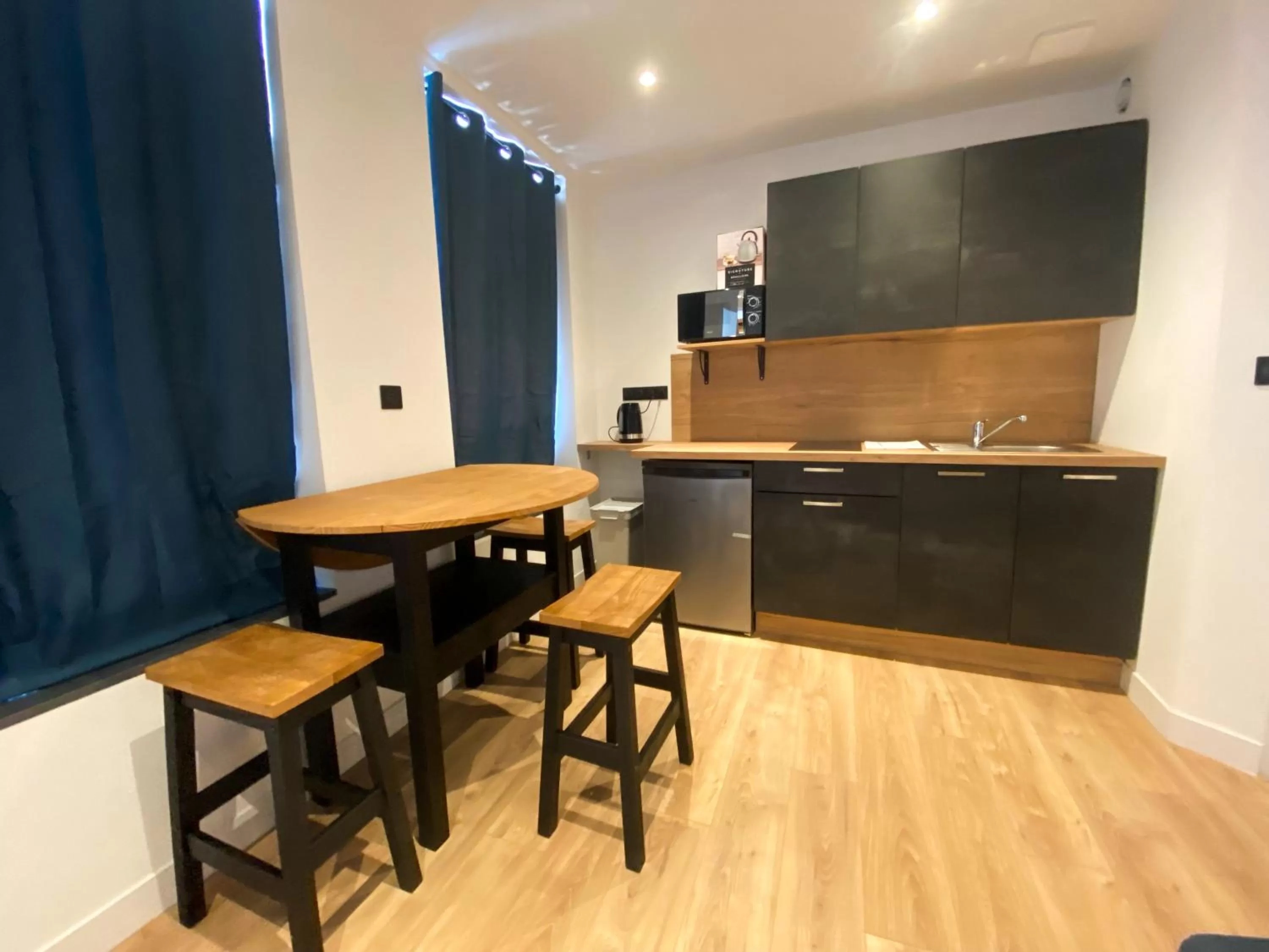 Kitchen/Kitchenette in Le Bras d'or Apparts et Spa