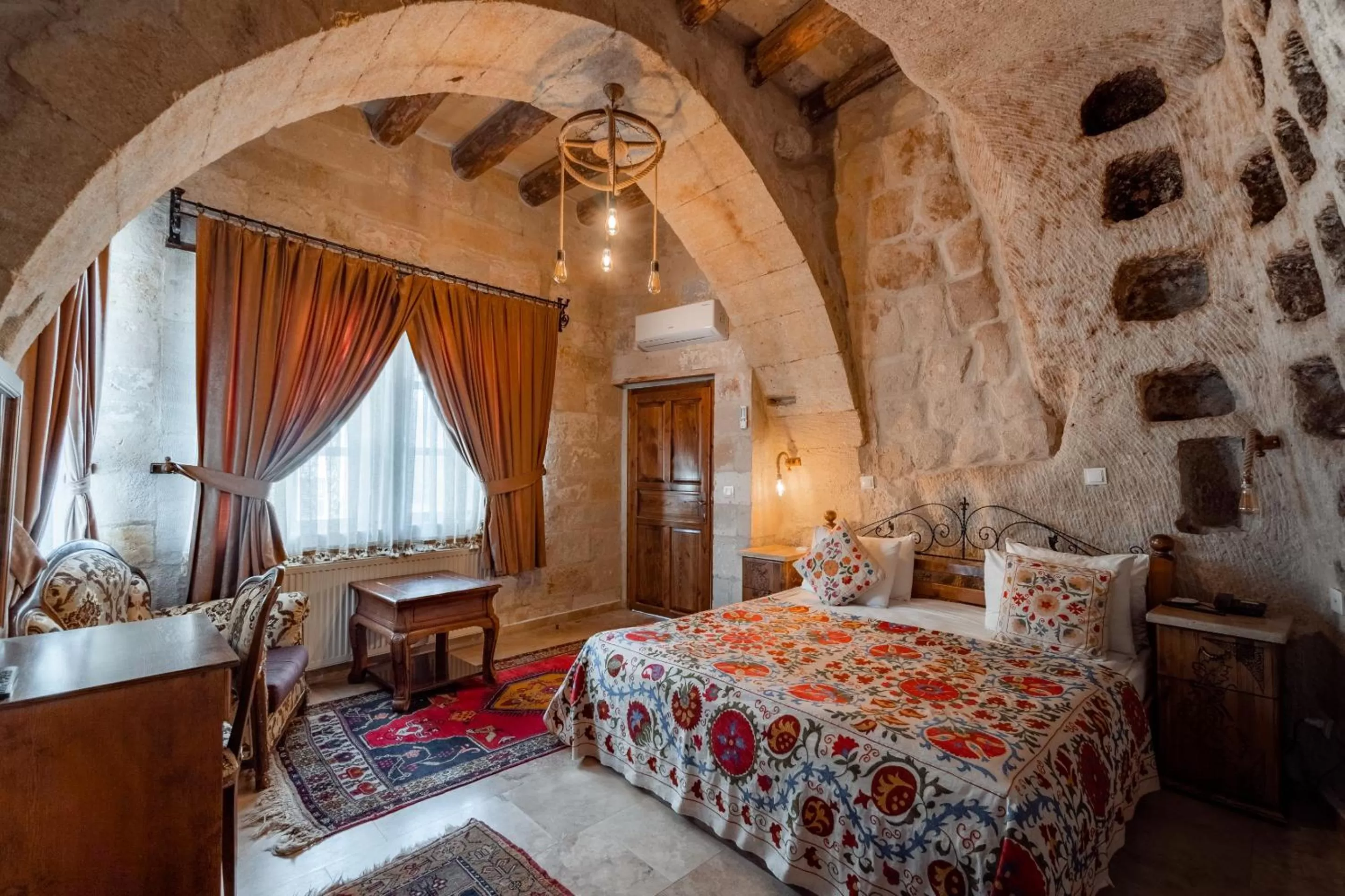 Bed in Amber Cave Suites