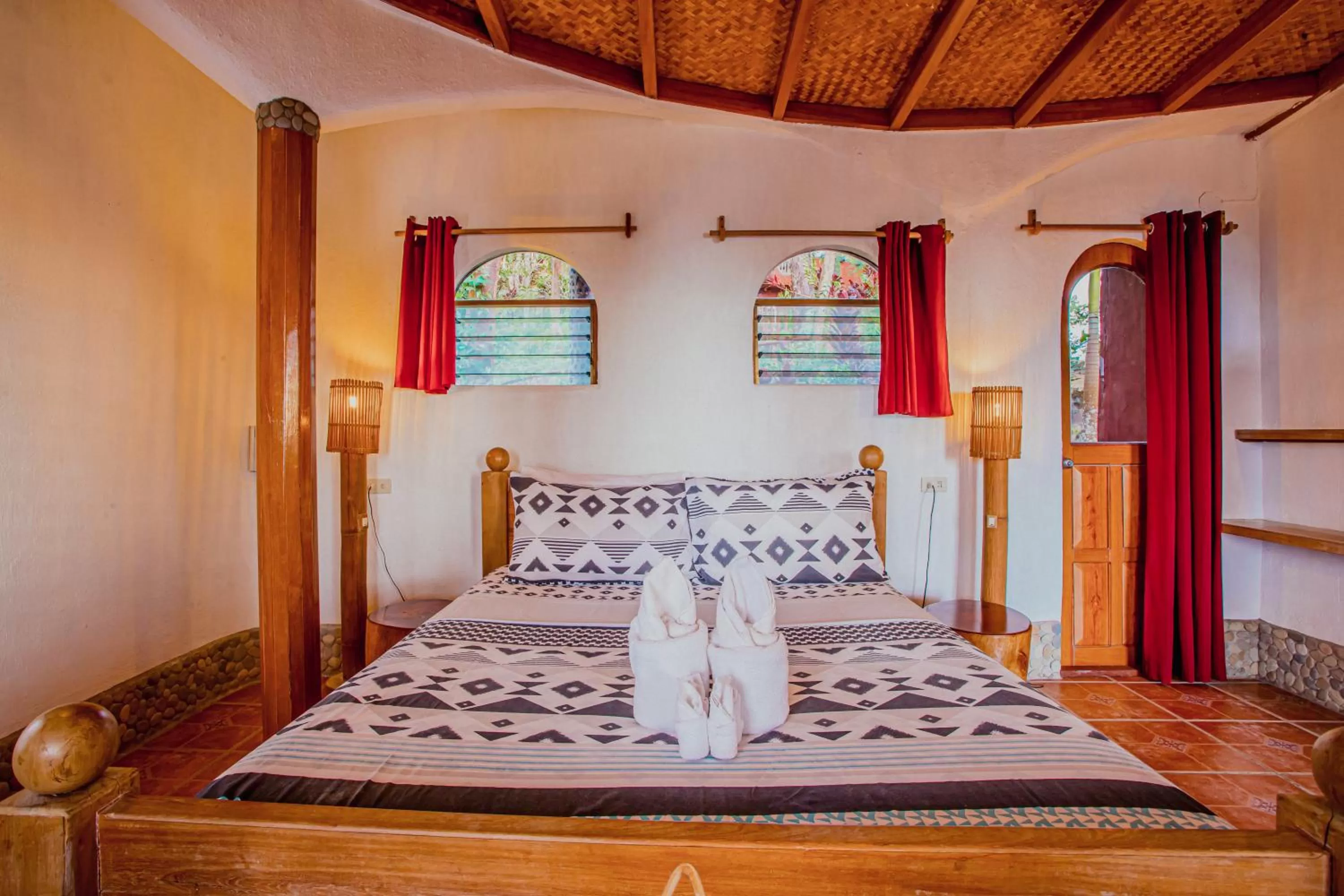 Bed in Atremaru Jungle Retreat