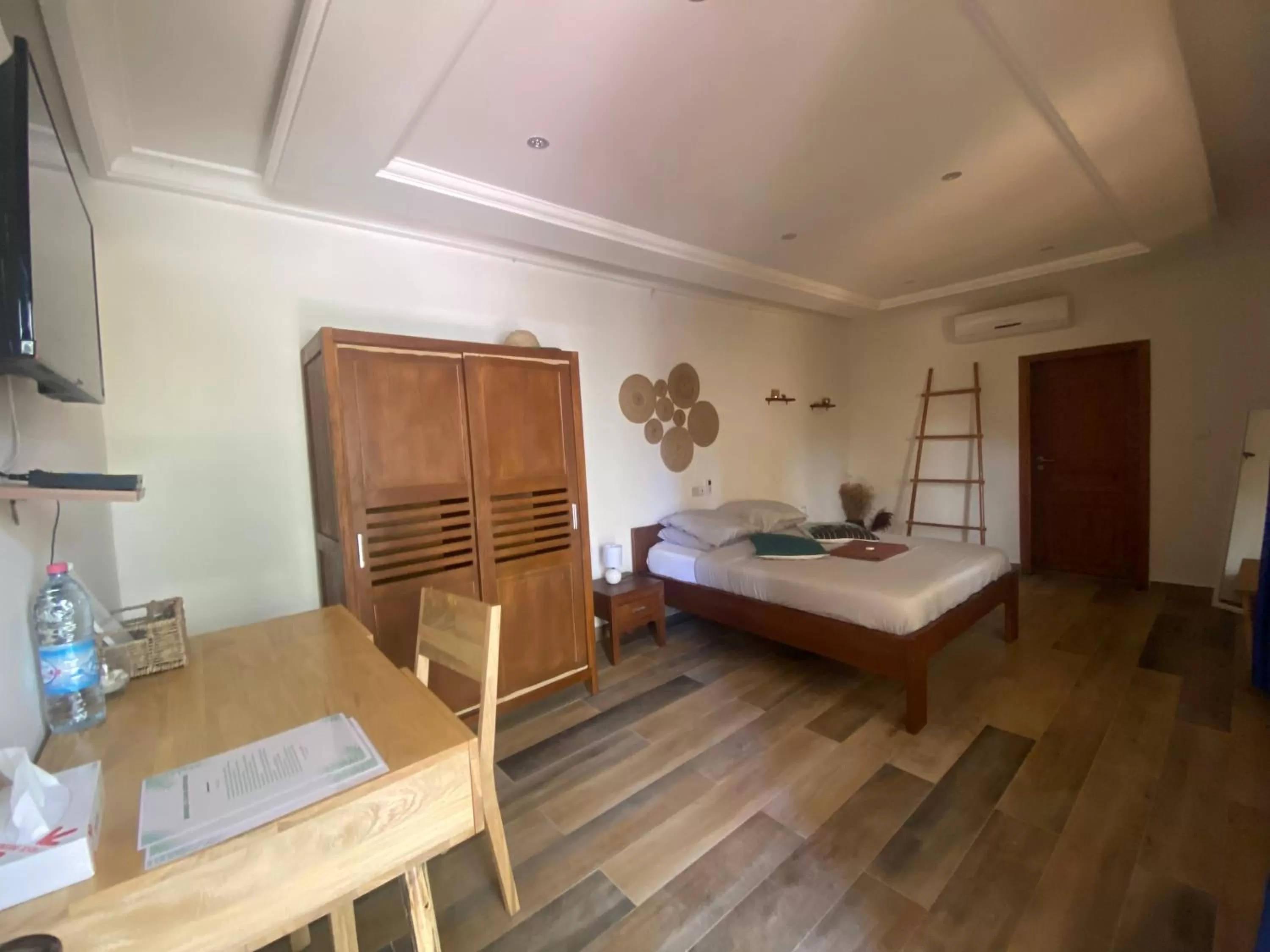 Bed in L'Oasis Guesthouse