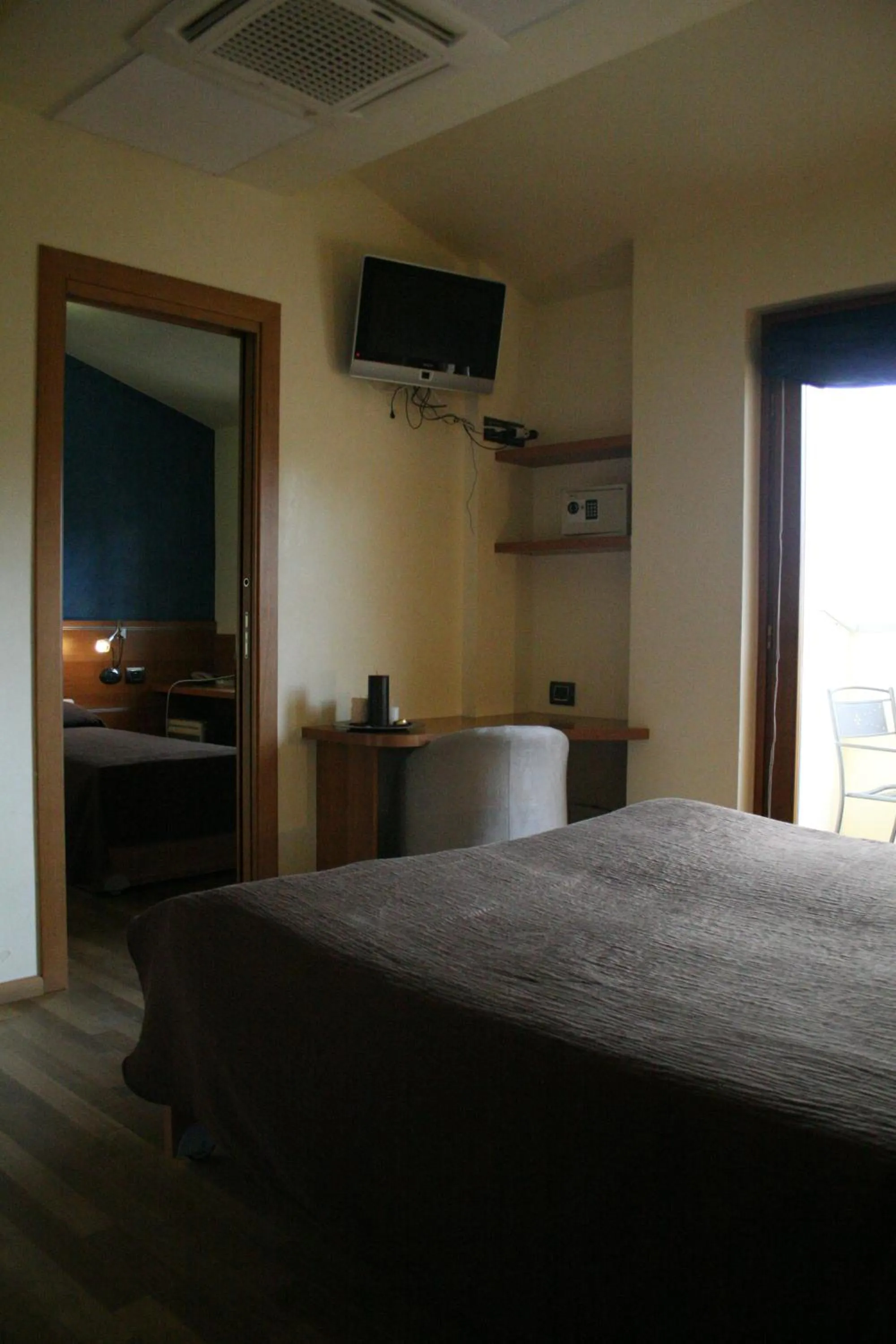 Bed in Hotel La Meridiana