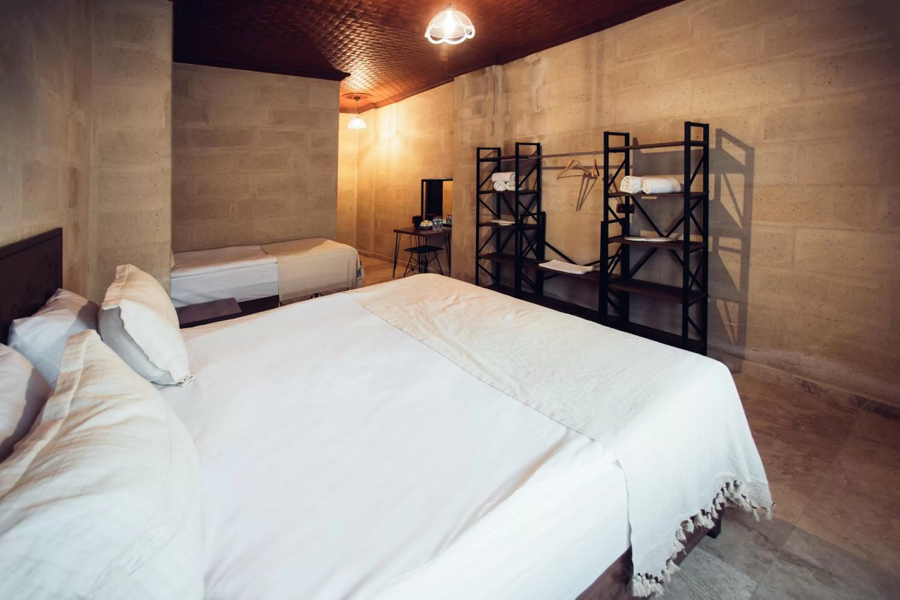 Bed in Azalea Terrace Cave Hotel