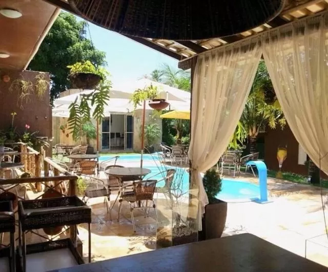 Balcony/Terrace, Swimming Pool in Pousada Recanto do Sal