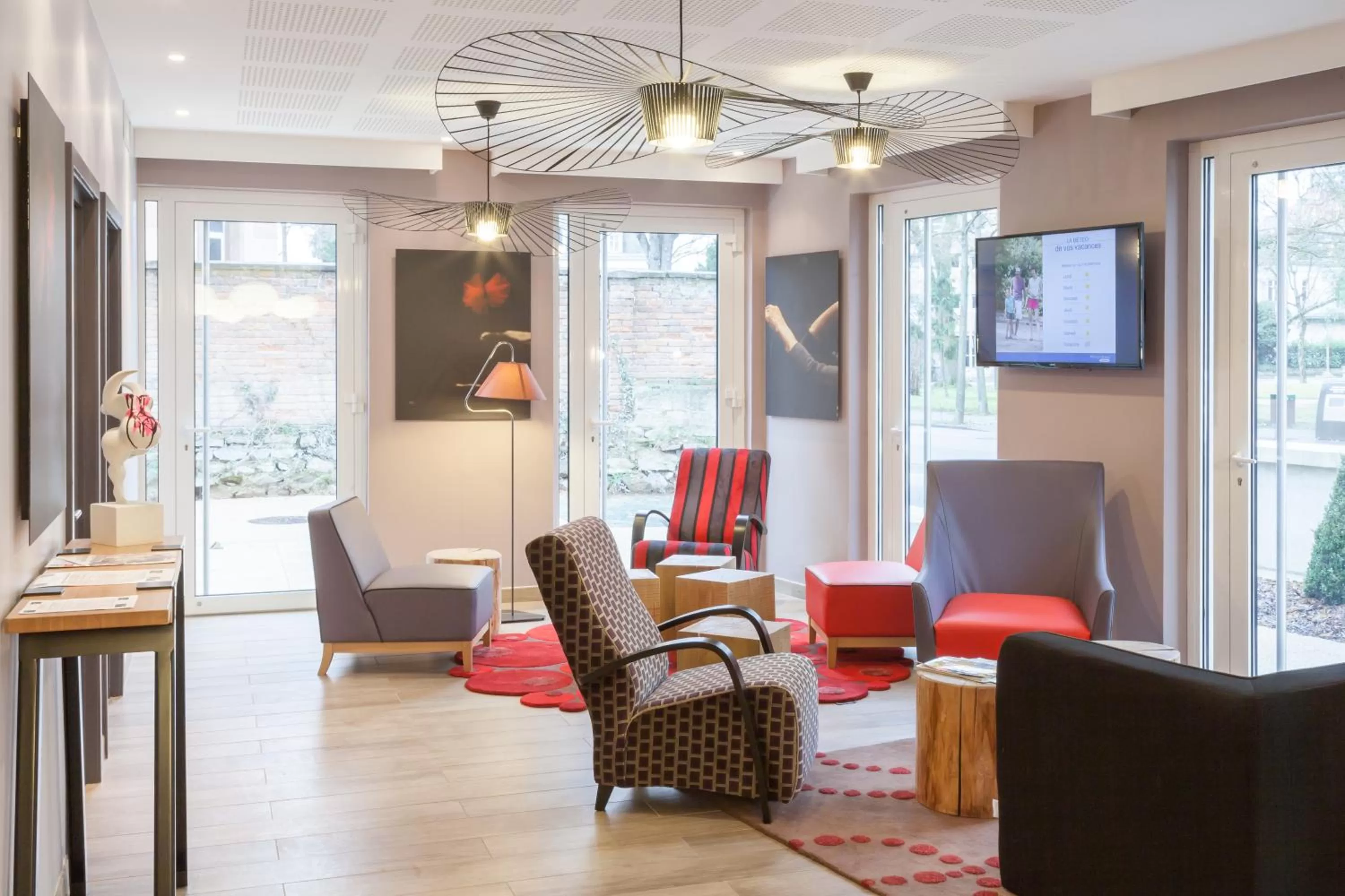 Communal lounge/ TV room in Résidence Pierre & Vacances La Petite Venise