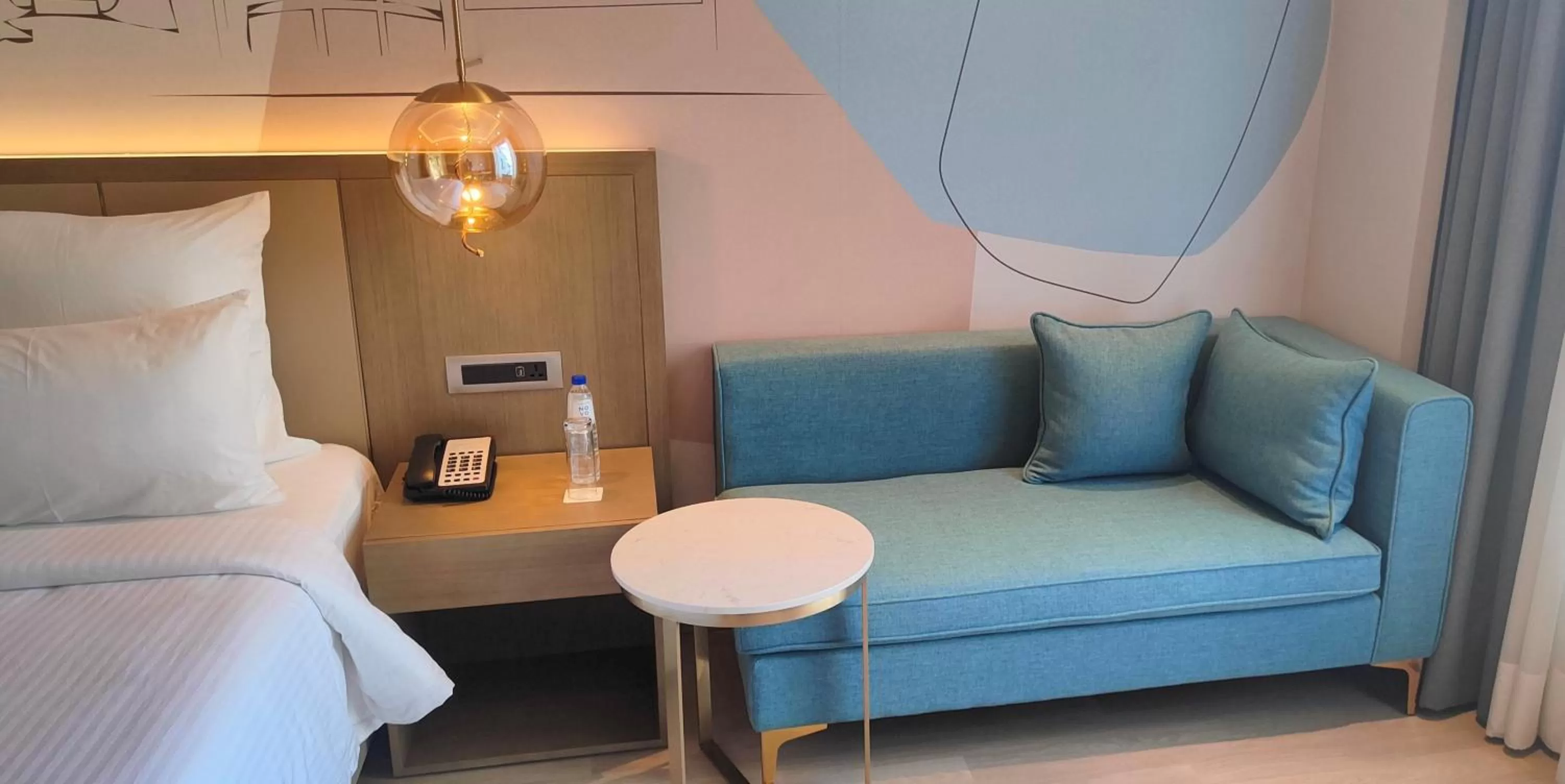 Seating area, Bed in Novotel Chandigarh Tribune Chowk