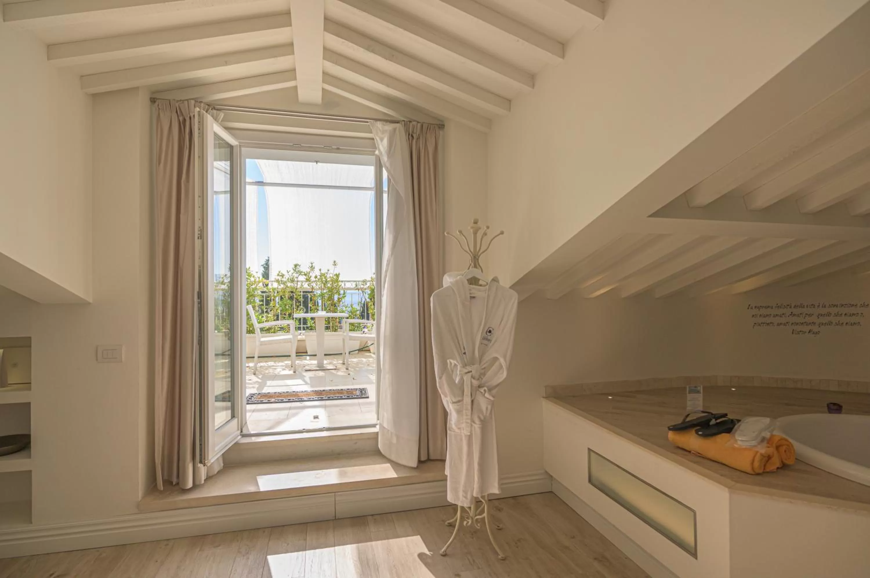 Bedroom in VILLA LIBERTY Boutique Hotel - Borgo Capitano Collection