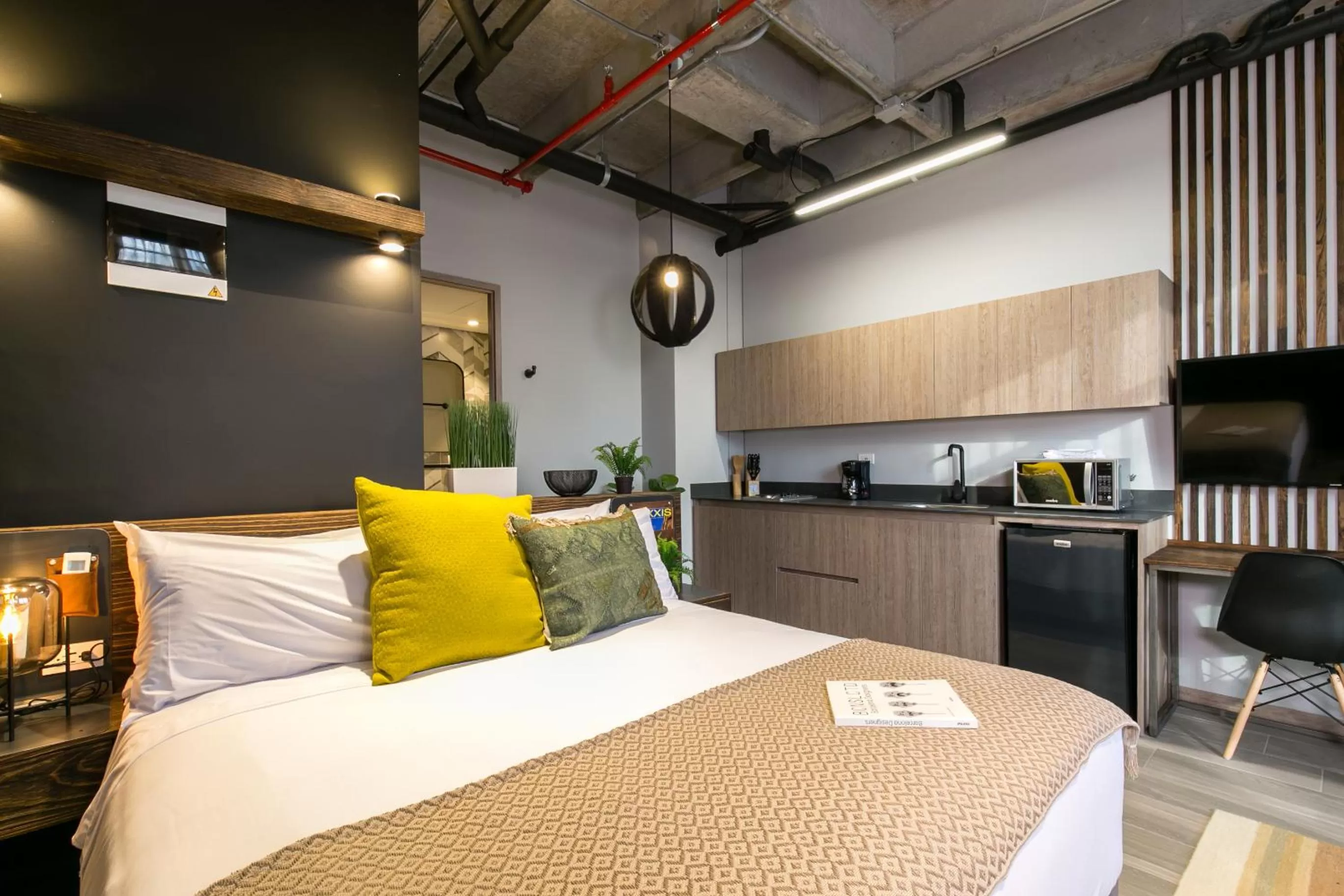 Bed in Factory Lofts Hotel