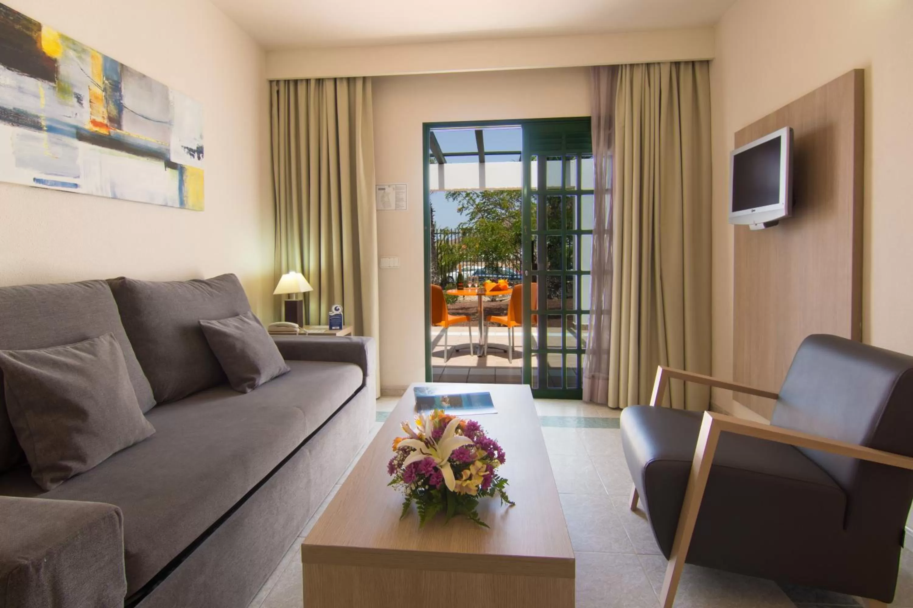 Living room in Relaxia Lanzasur Club - Aqualava Water Park