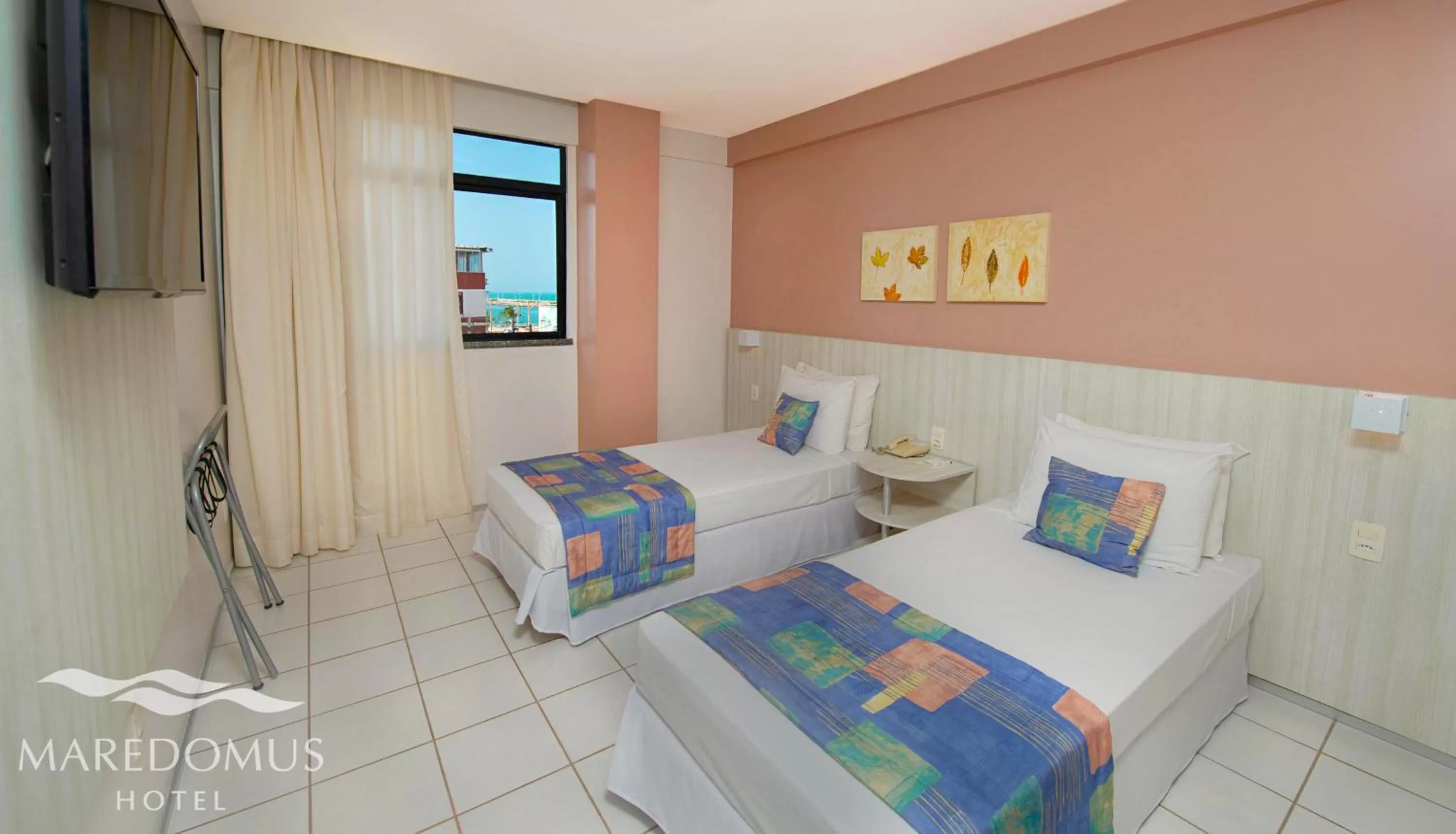 Bed in Maredomus Hotel