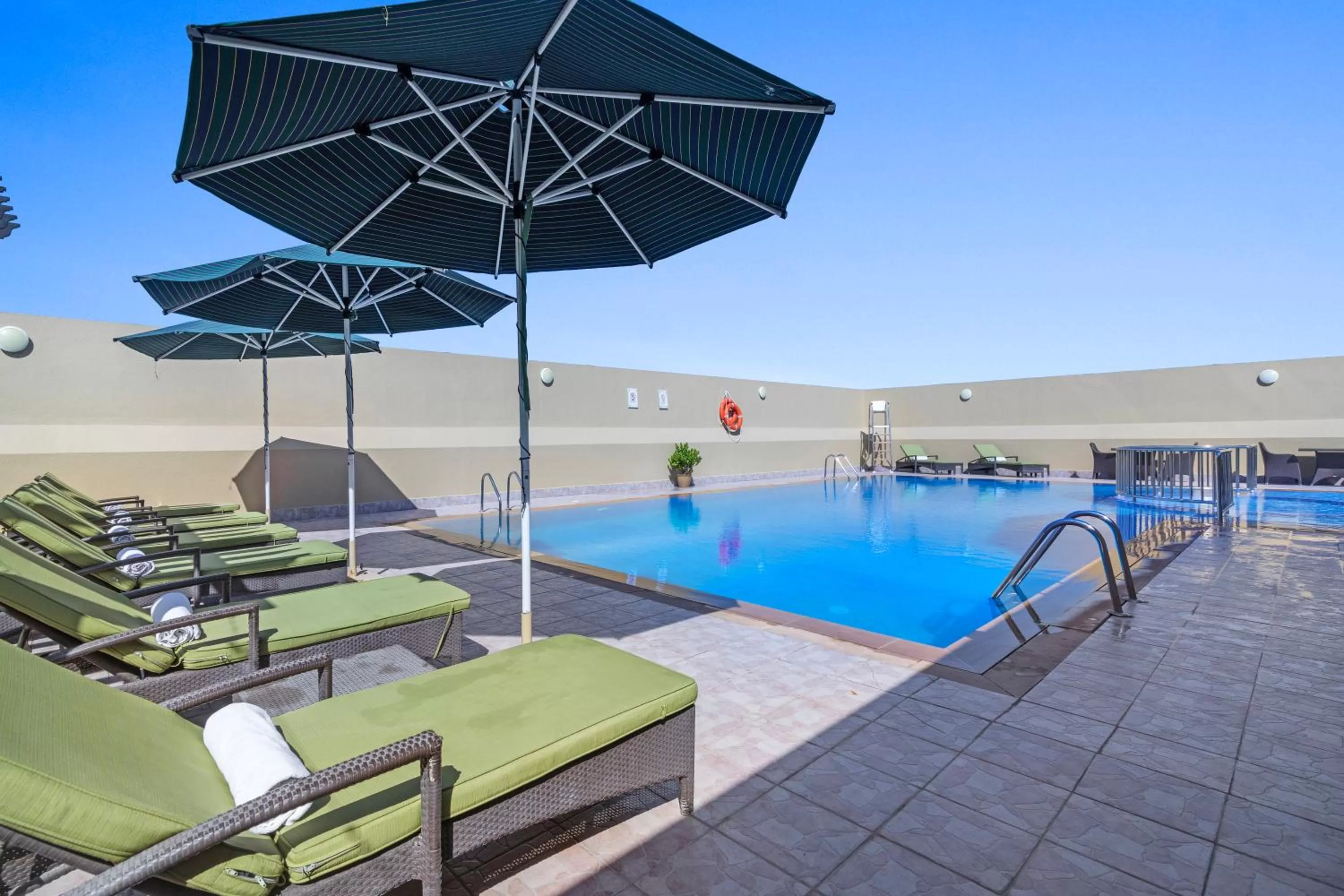 Swimming pool in Al Khoory Hotel Apartments Al Barsha
