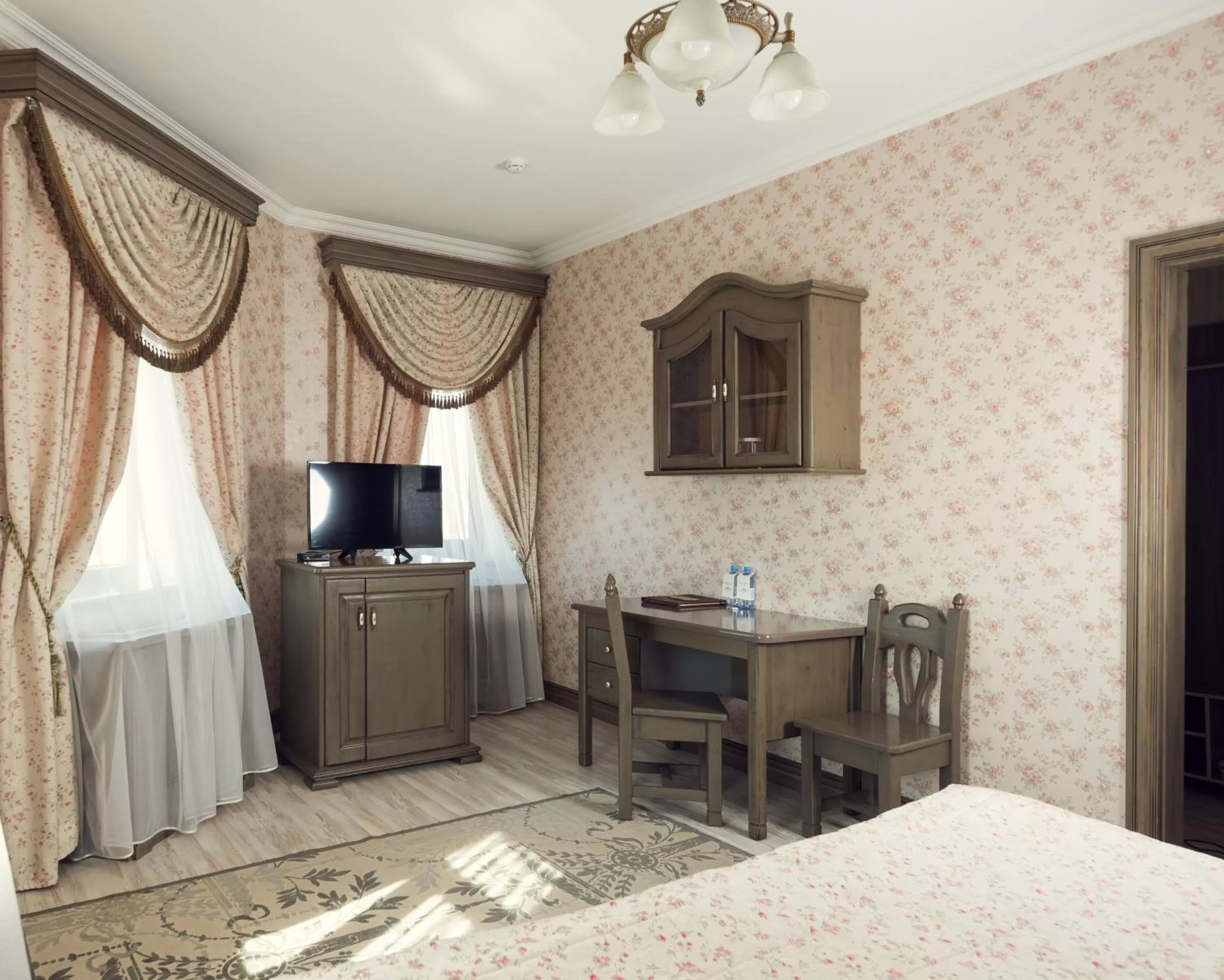 Living room, TV/Entertainment Center in Boutique Hotel Traditional