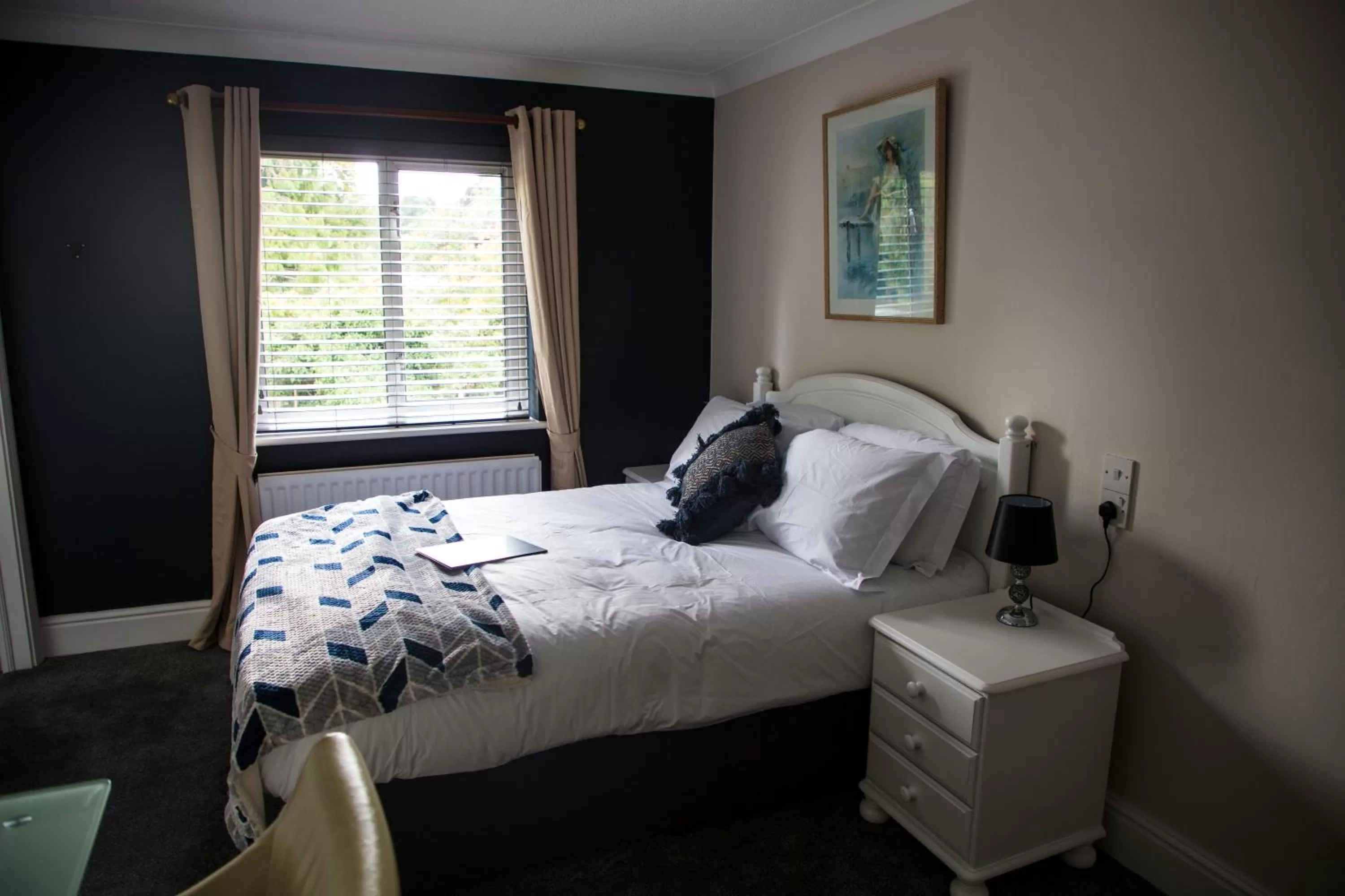 Bed in The Charlton Boutique Hotel