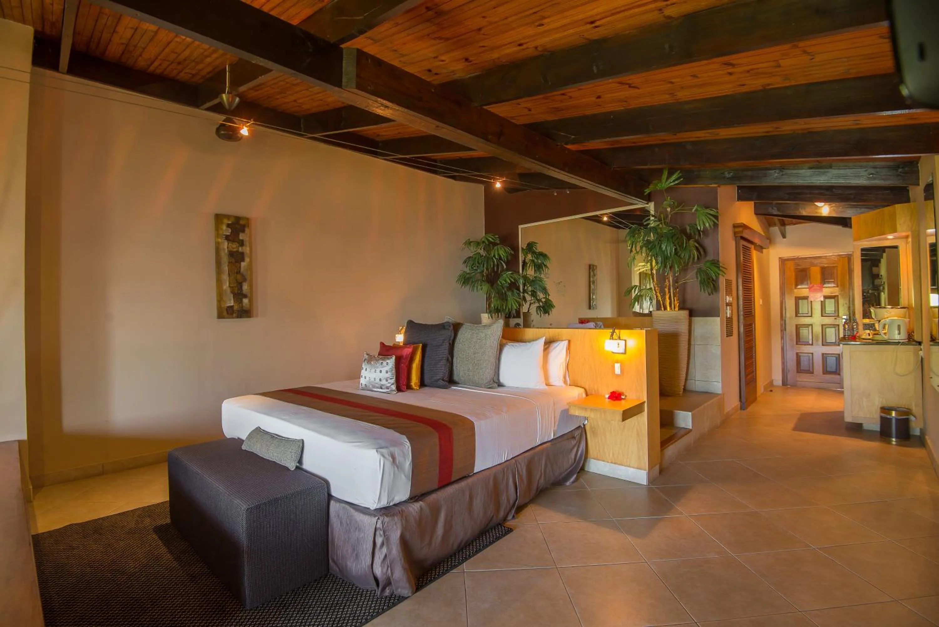 Photo of the whole room, Bed in Coco de Mer Hotel and Black Parrot Suites