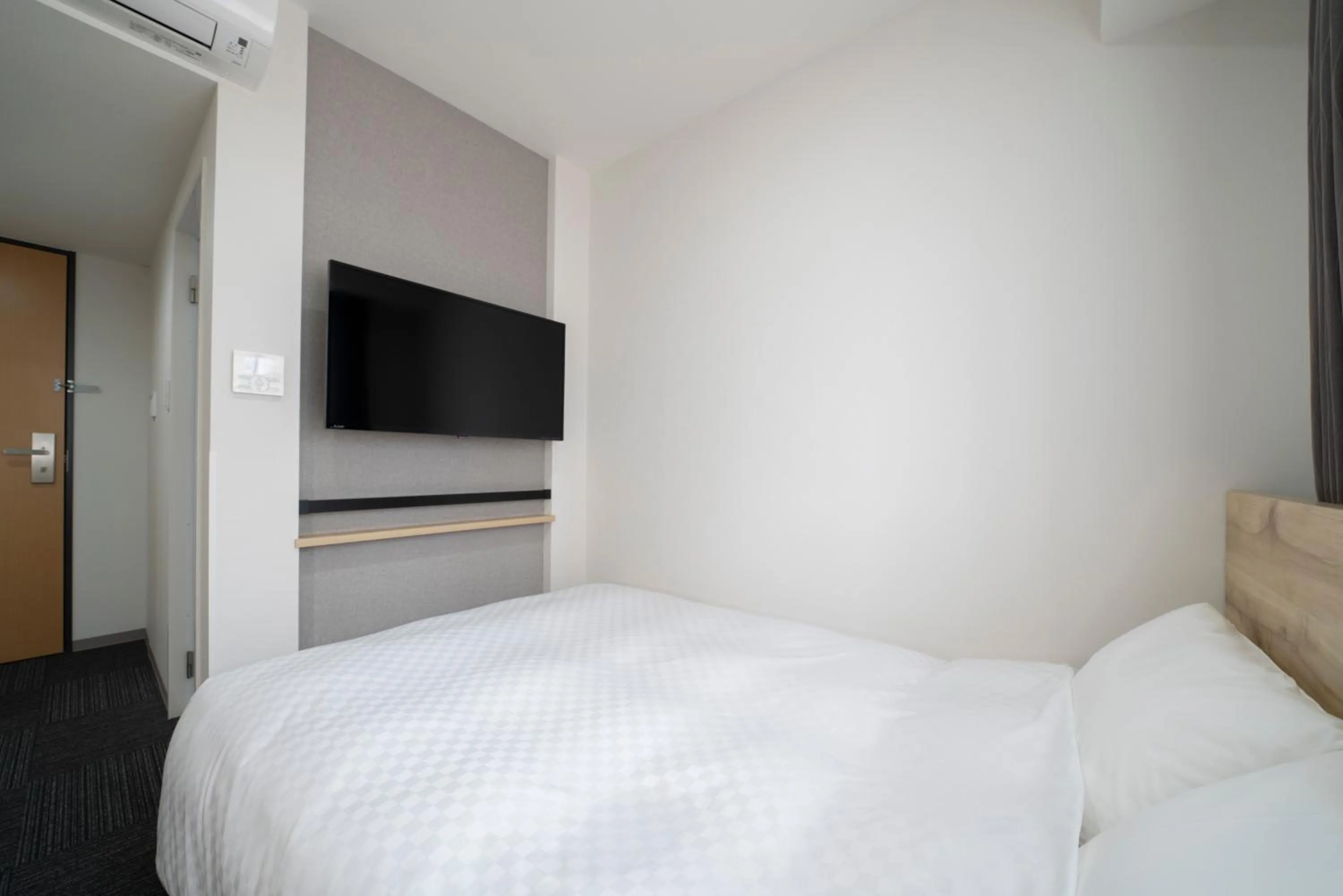 Bed in Washington R&B Hotel Nagoya Shinkansenguchi