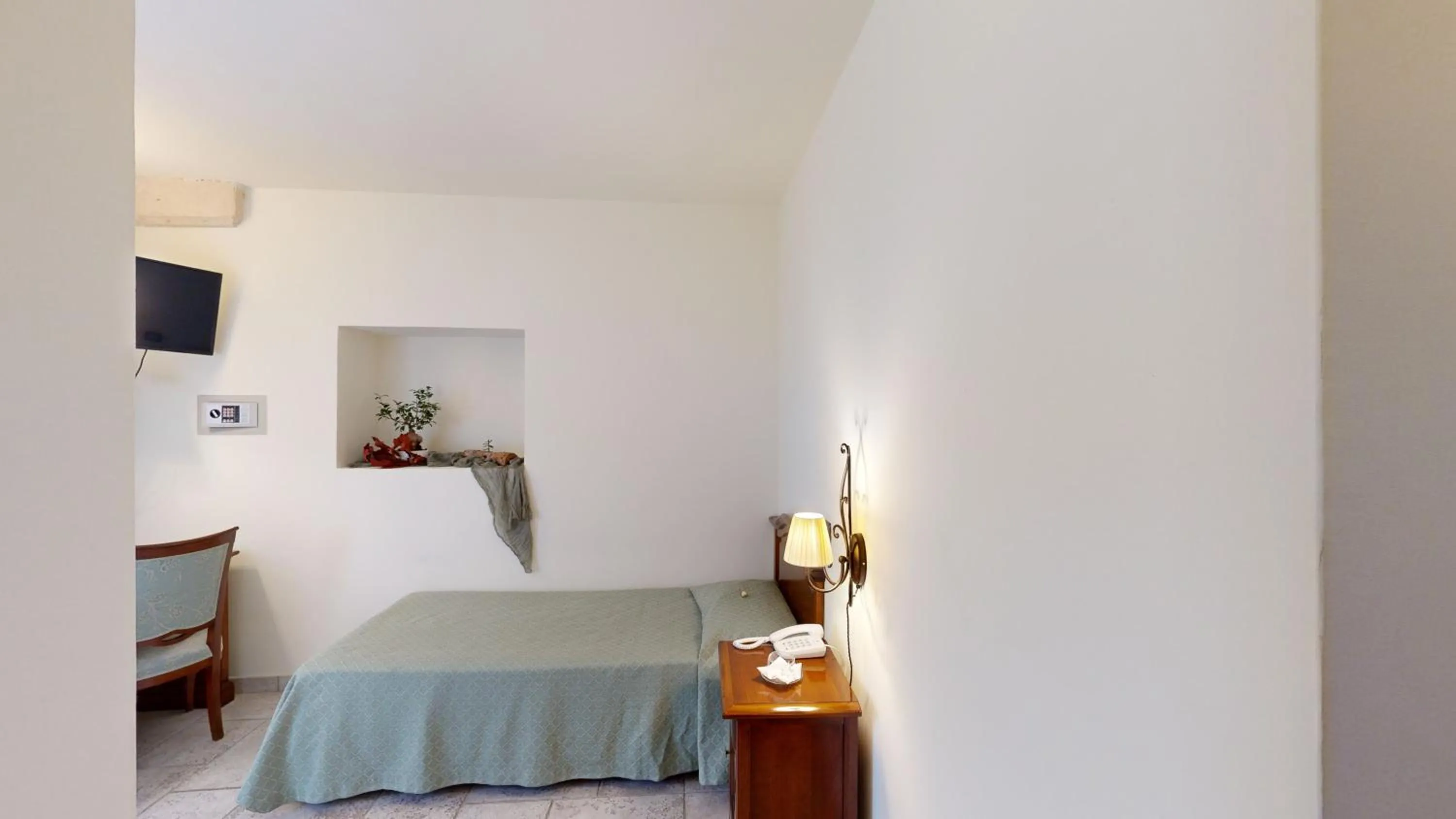 Bed in Relais Reggia Domizia